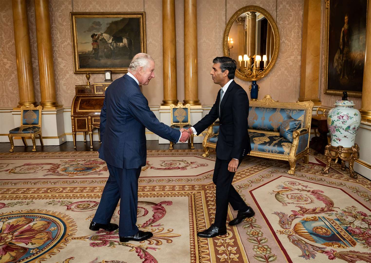The King welcomes Rishi Sunak during an audience at Buckingham Palace, where he invited the newly-elected leader of the Conservative Party to become Prime Minister and form a new government (Aaron Chown/PA)
