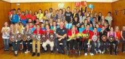 Youngsters at the gala are seen along with guests John and Janice Henderson (front centre), who handed over the trophies.