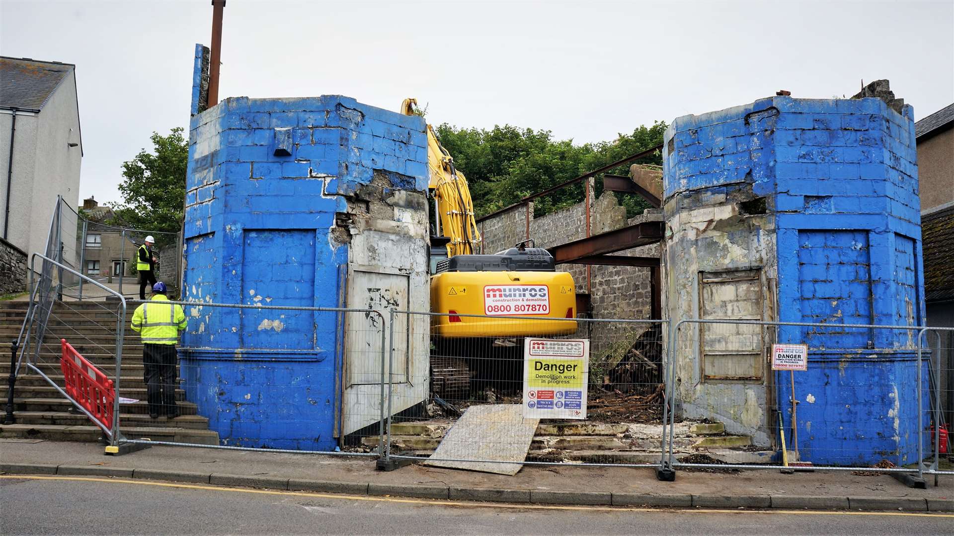 The demolition team from Alness get to work on the eyesore building yesterday. Pictures: DGS