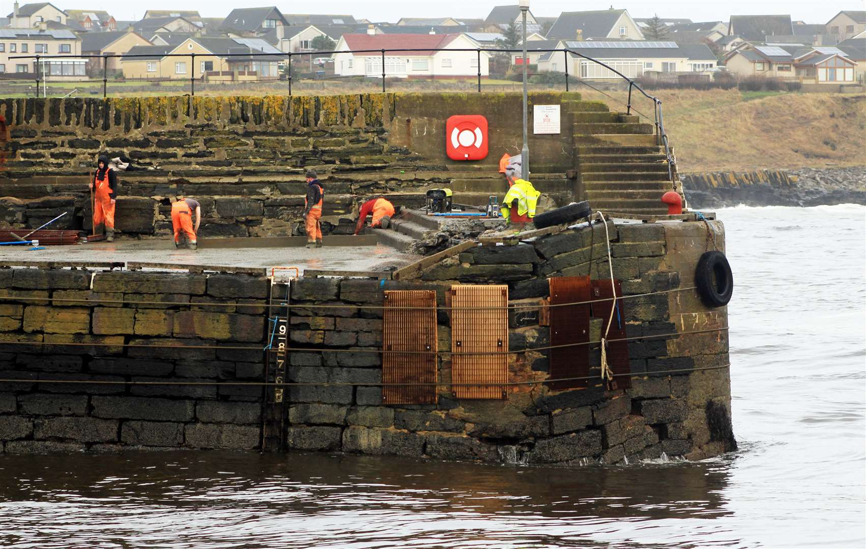 Concrete work being carried out on Wick's outer harbour quay in January as part of the emergency stabilisation scheme. Picture: Alan Hendry