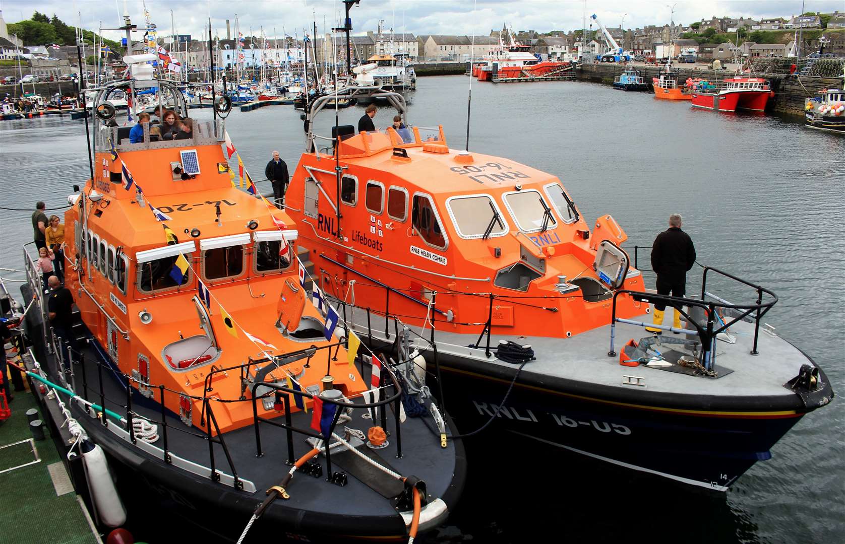 The Wick lifeboat, Roy Barker II (left), and its Longhope counterpart, Helen Comrie, at last summer's Wick RNLI Harbour Day fundraising event. Picture: Alan Hendry