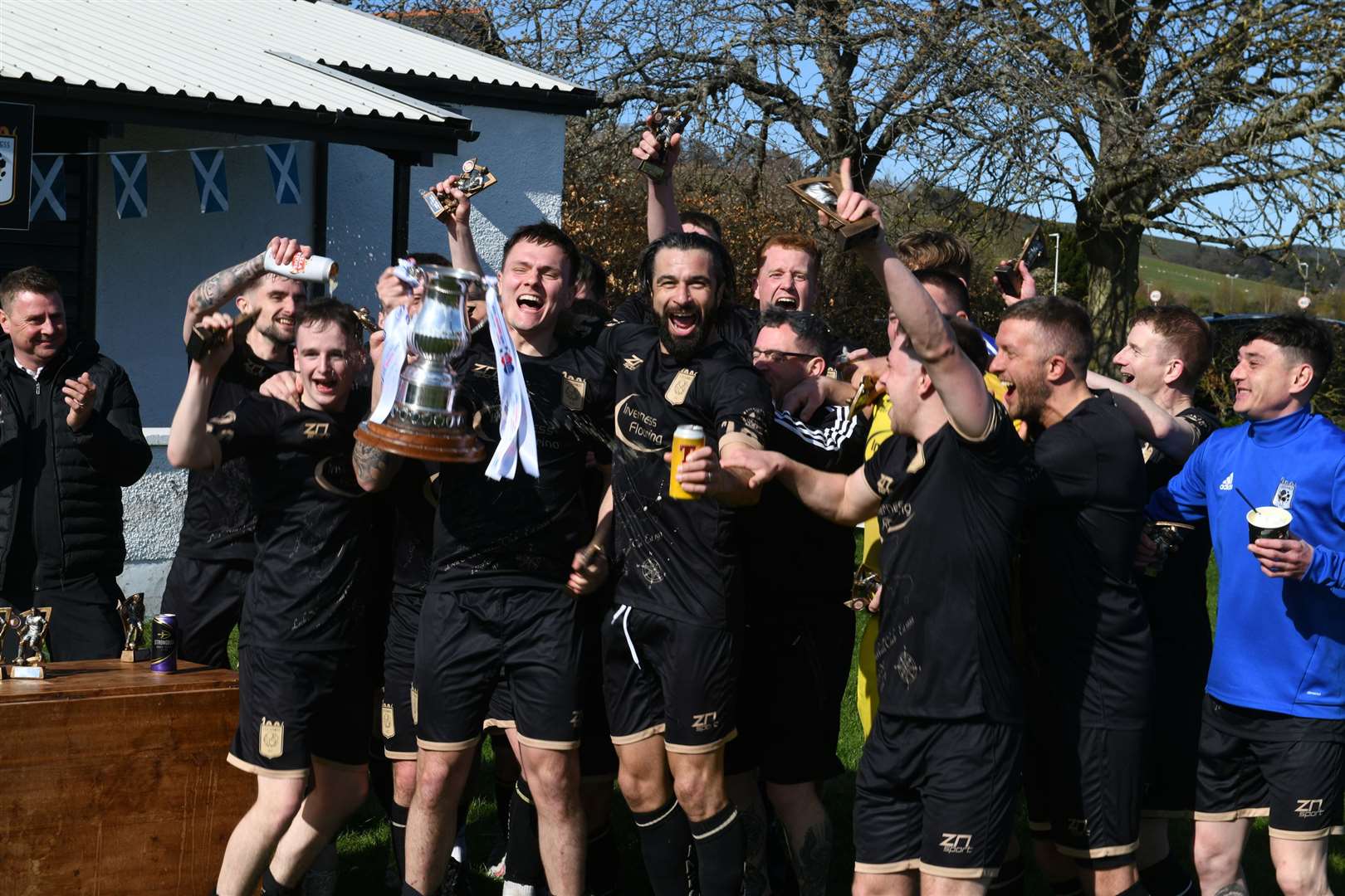 Champions Loch Ness celebrate after receiving the North Caledonian League trophy. Picture: James Mackenzie