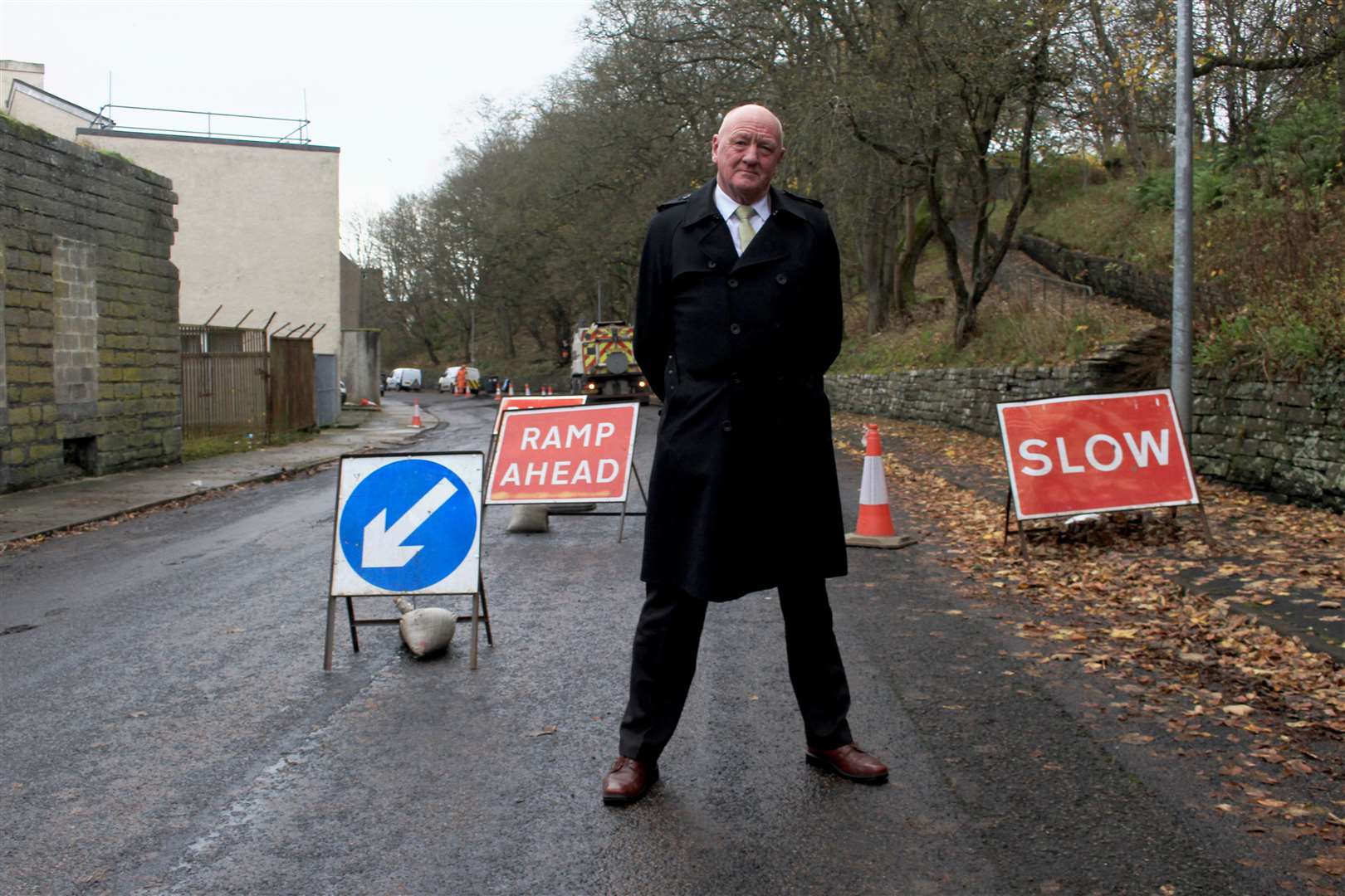 Caithness Roads Recovery co-founder Iain Gregory in Wick's Union Street last month as Highland Council workers carry out repairs to potholes. Picture: Alan Hendry