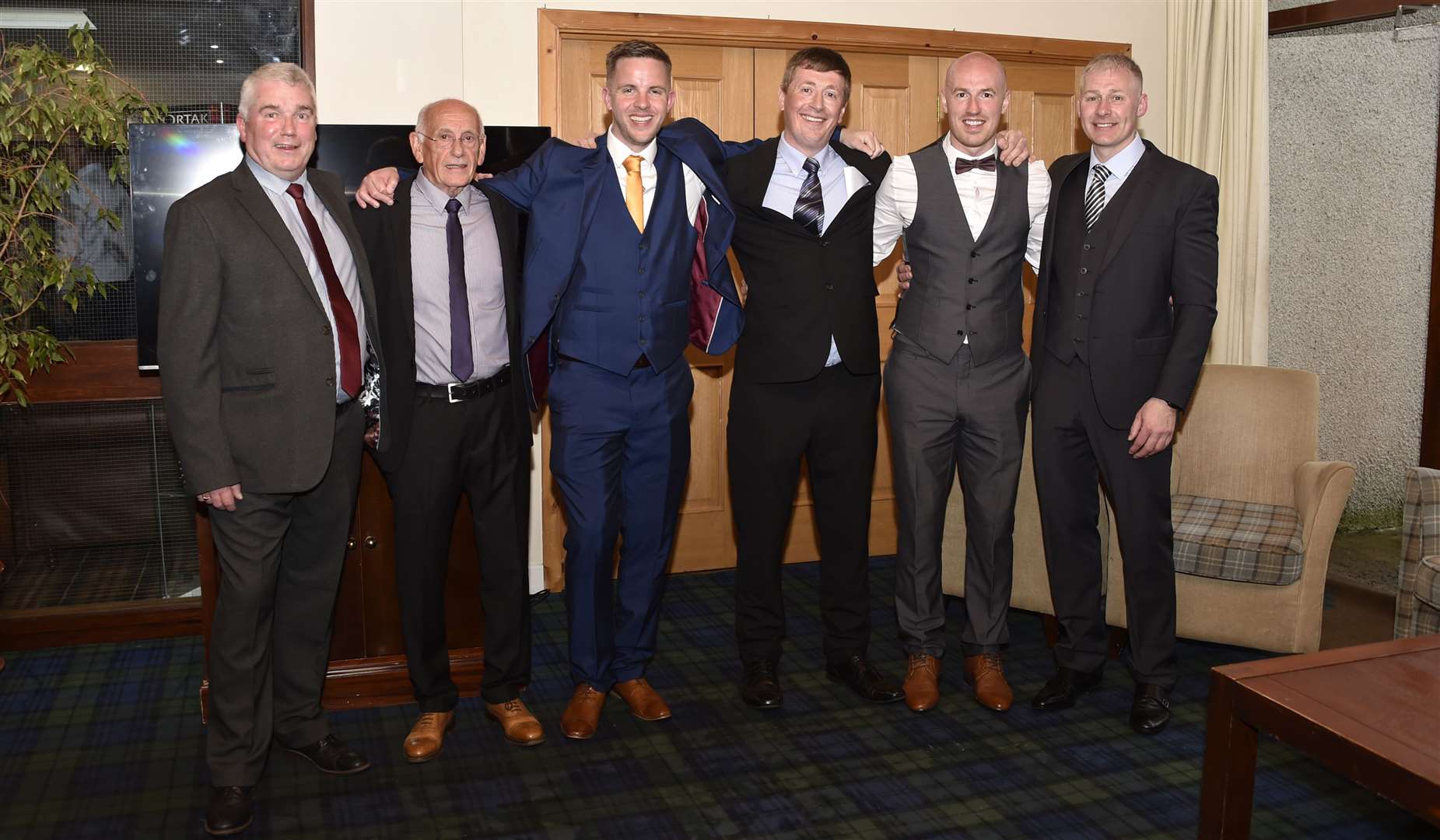 Alan Farquhar with his testimonial committee in the Norseman Hotel. Picture: Mel Roger