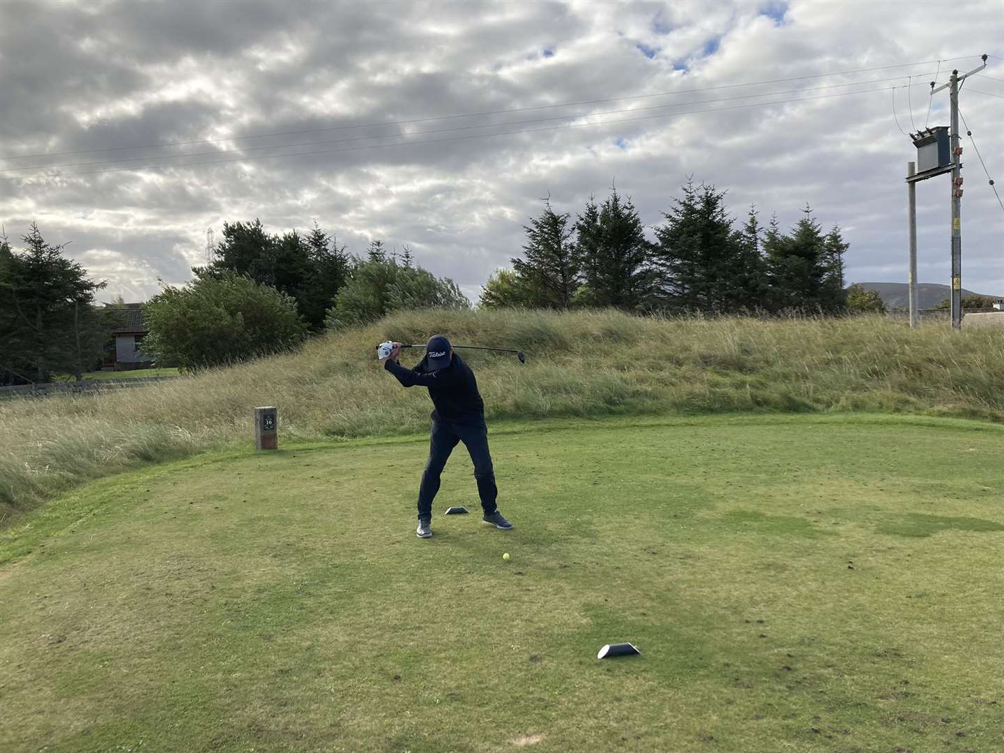 Gavin Gunn teeing off at the 16th hole. He won round two of the Winter Eclectic competition.