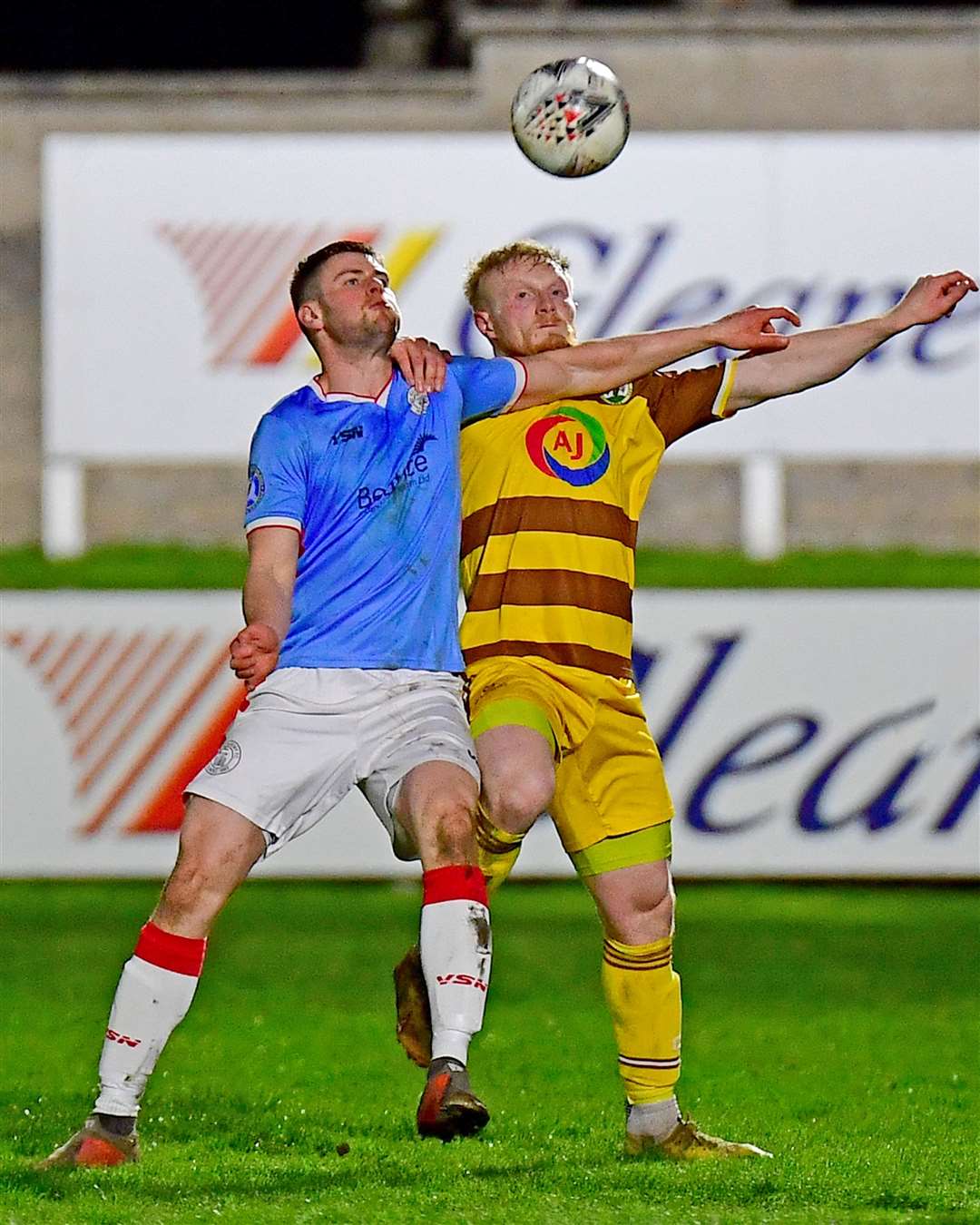 Marc Macgregor and Forres Mechanics' Calum Howarth contest a high ball at at Mosset Park. Picture: Mel Roger