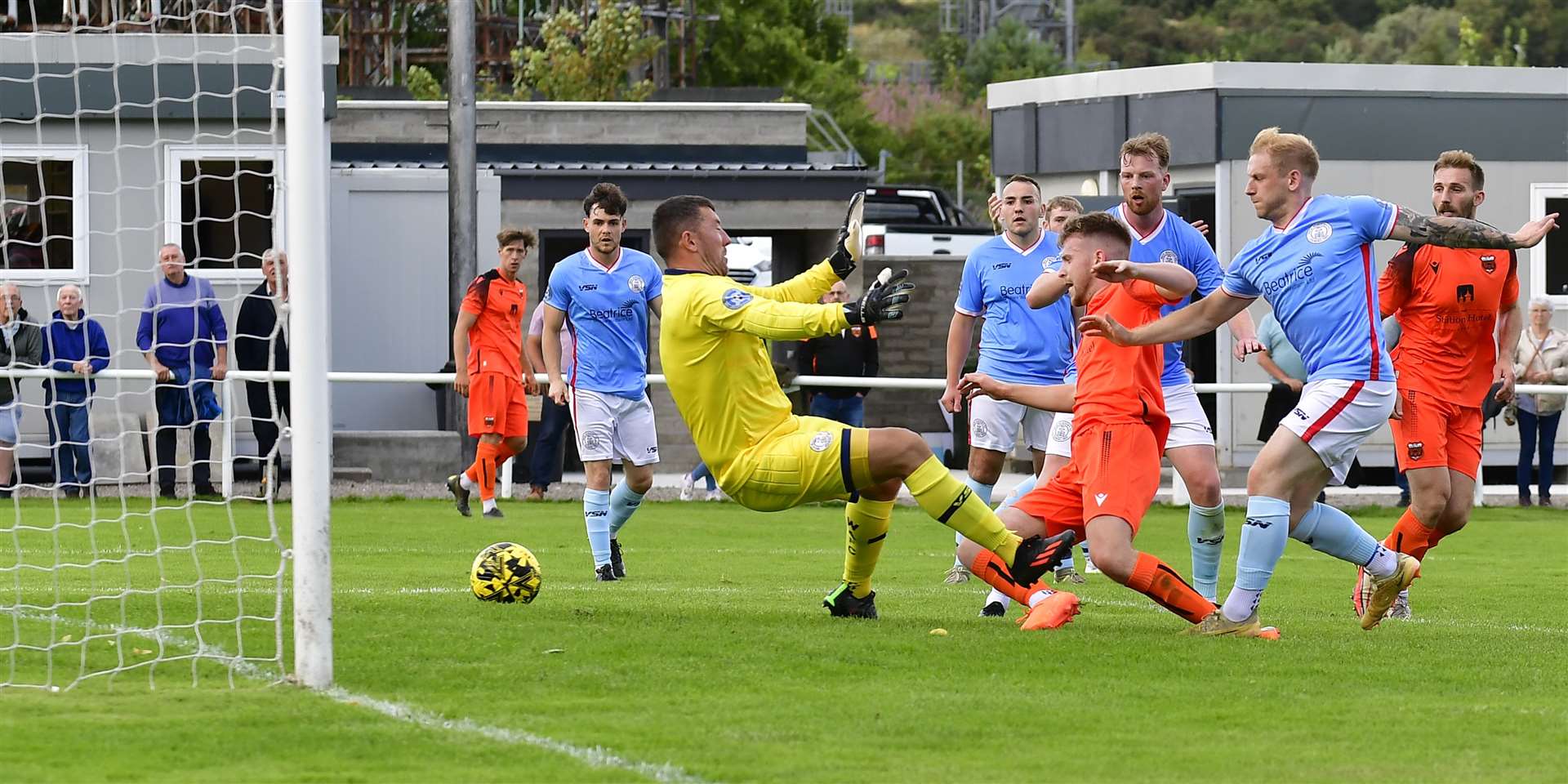 Jake Thomson sticks the ball past Wick keeper Graeme Williamson to make it 2-0 to Rothes at Mackessack Park. Picture: Mel Roger