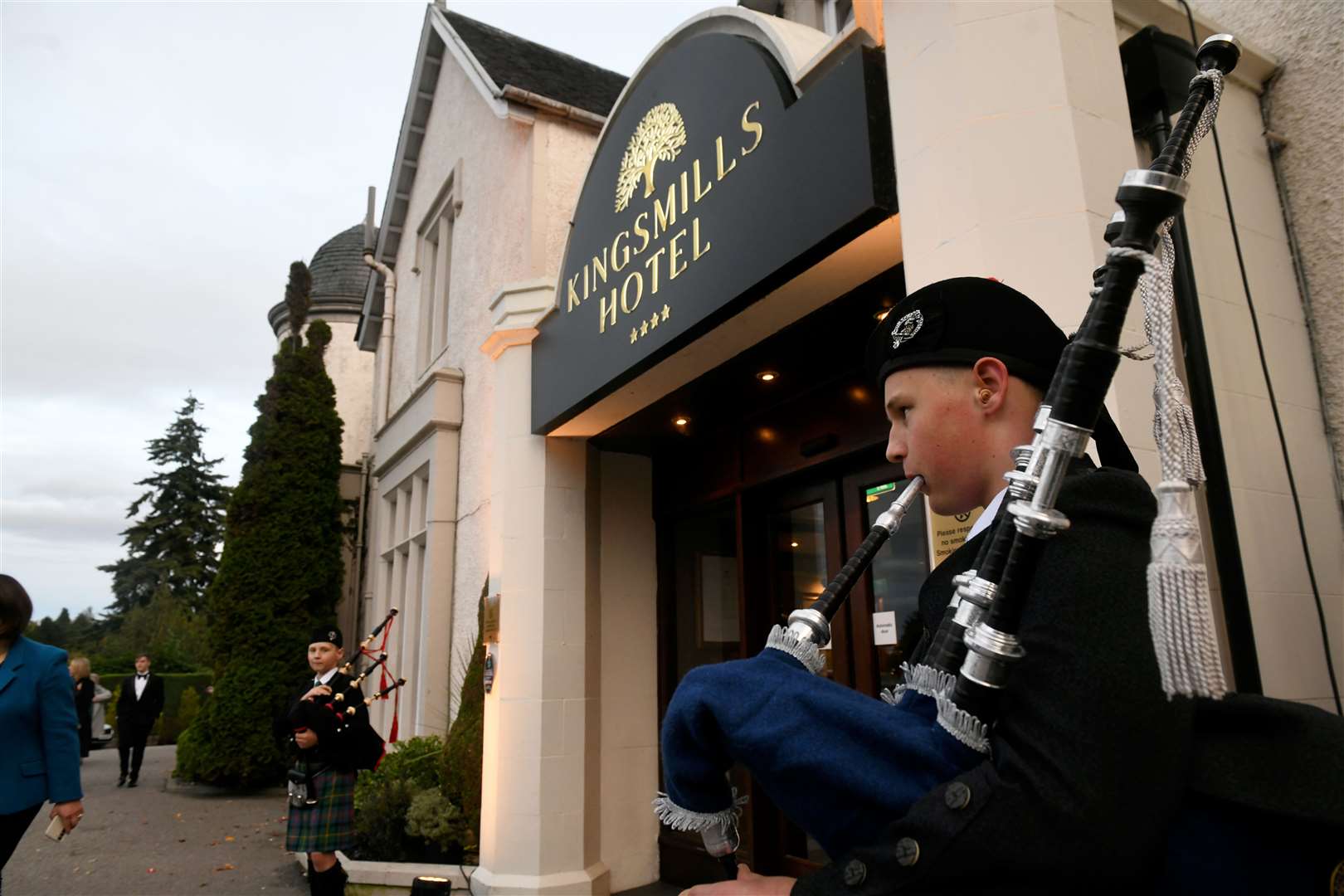 Ronnie and Charlie Maclennan were playing the bagpipes at the entrance as the guests arrived. Picture: James Mackenzie