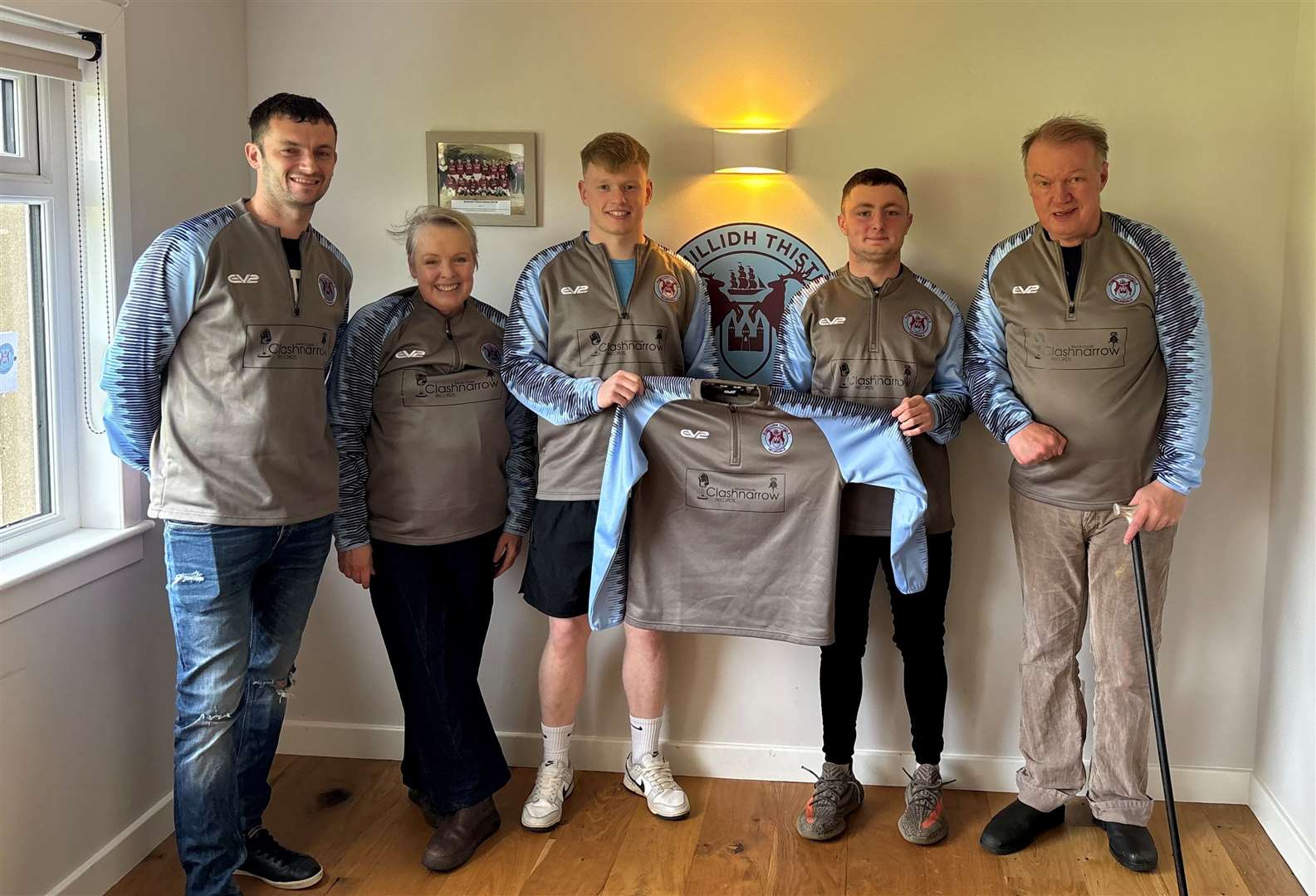 Bunillidh Thistle boss Dean Cowie and players Cameron Yuill and Alfie Mackay were presented with a new set of tracksuits by Edwyn Collins and wife Grace Maxwell today. Picture: Isla Cowie.