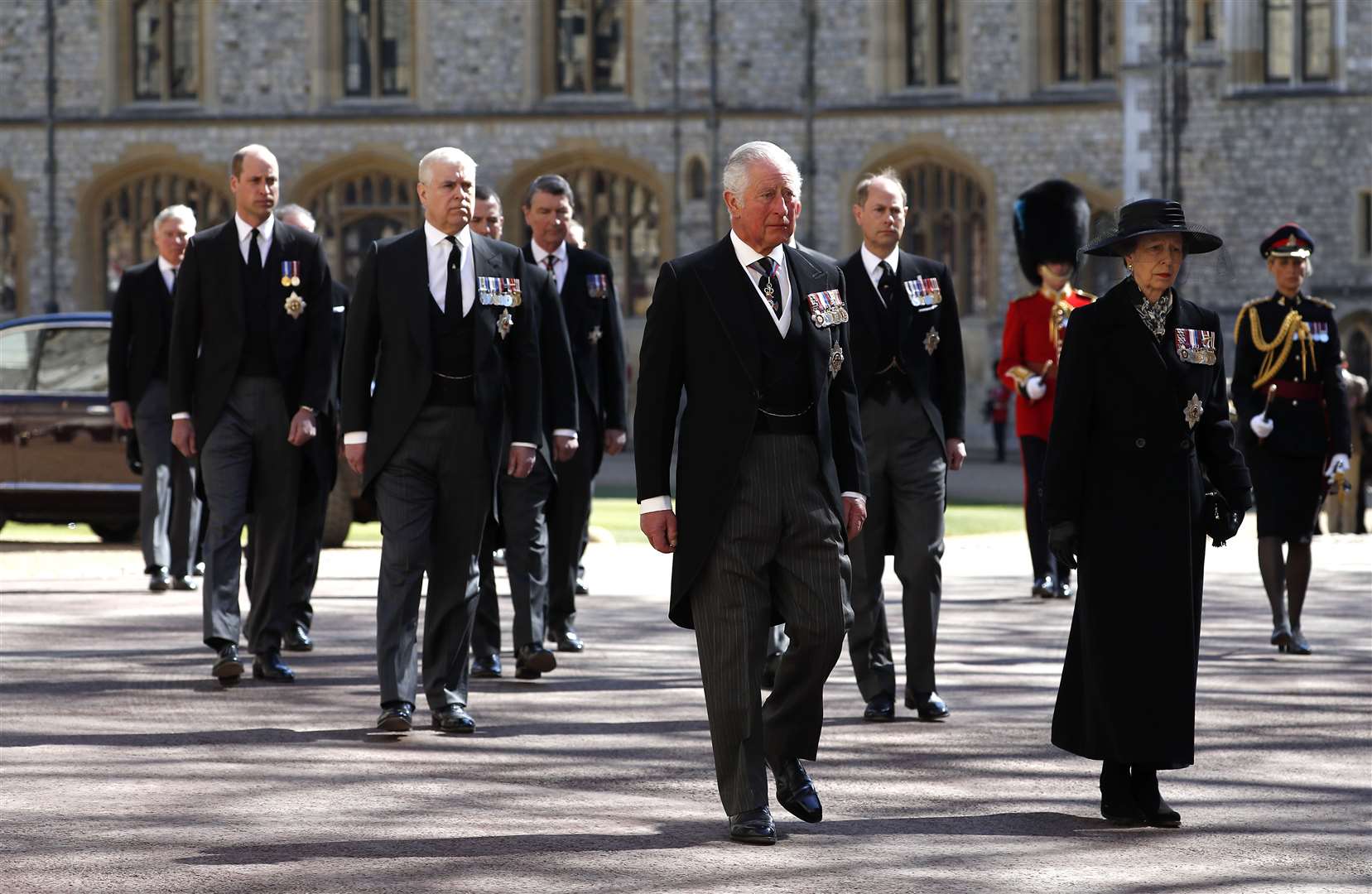 The Princess Royal, Prince of Wales, Duke of York, Earl of Wessex, Duke of Cambridge, Peter Phillips, Duke of Sussex, Earl of Snowdon David Armstrong-Jones and Vice-Admiral Sir Timothy Laurence follow the Duke of Edinburgh’s coffin at Windsor Castle (Alastair Grant/PA)
