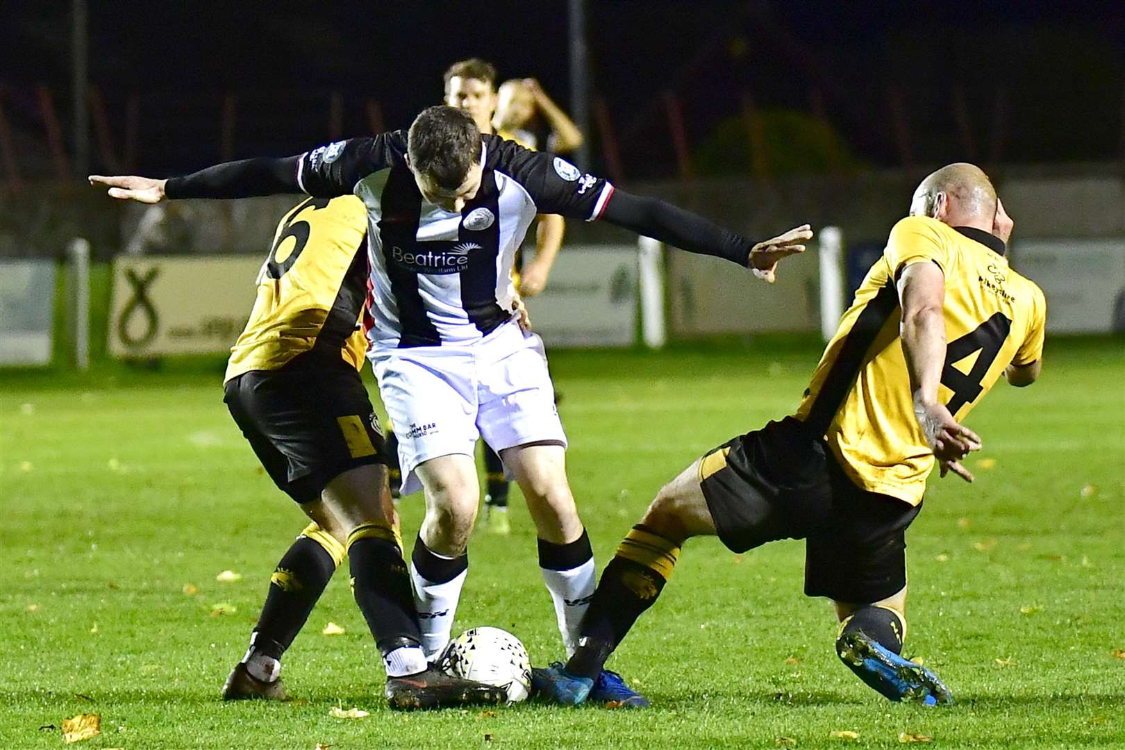 Nairn duo Wayne Mackintosh and Ross Tokely combine to stop Ryan Campbell in his tracks. Picture: Mel Roger
