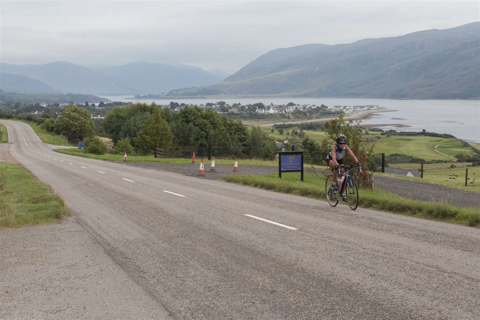 Just under five hours from setting out from Inverness Castle, Lorna climbs a steep hill out of Ullapool at 5.02pm on Tuesday. Picture: Robert MacDonald / Northern Studios