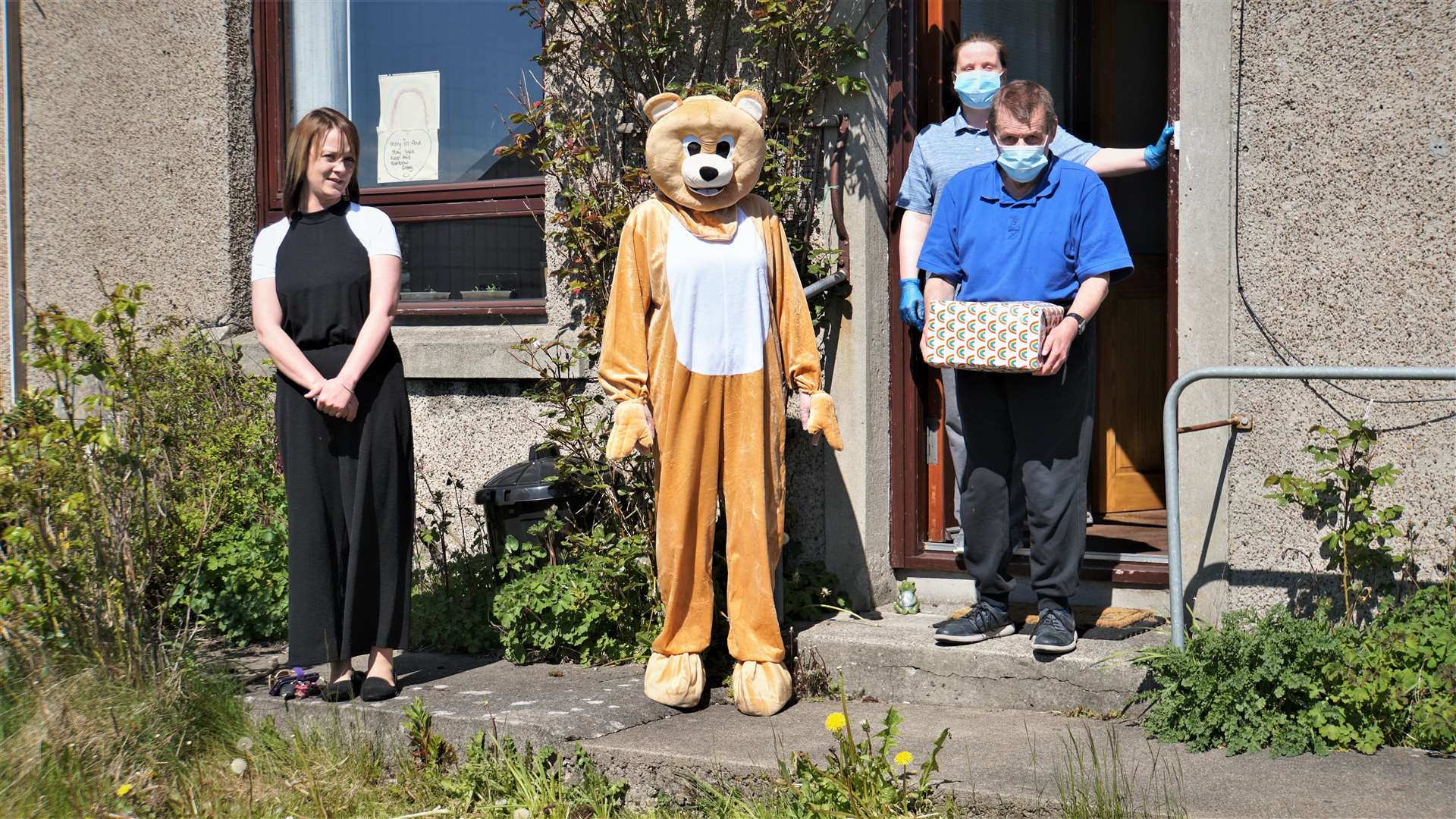 From left: Sarah Sinclair, service leader for Community Integrated Care in Caithness, the company care bear courtesy of care worker Wendy McLeod, carer Geraldine Leslie and service user Peter Storm. Pictures: DGS
