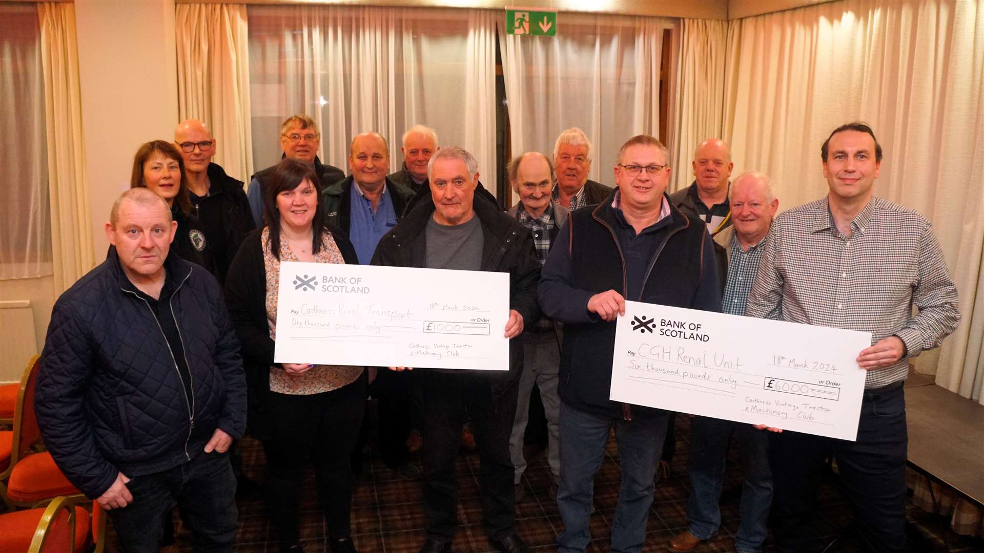The cheque for £1000 on the left is given by Brian Polson, vice chairman of the tractor club, to Katy Malcolm from Caithness Rural Transport who is accompanied by driver Roy Majilton. The cheque on the right hand side is for £6000 and is being handed over by Andrew Mackay, the club's chairman, to Bruce Honeyman (far right), a charge nurse at the Wick hospital's renal unit. Picture: DGS
