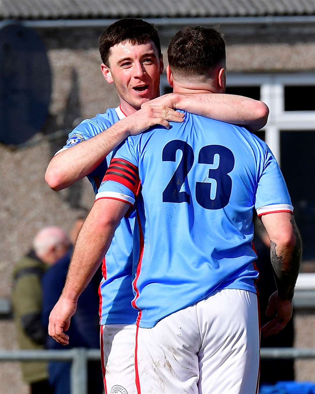 Kyle Henderson celebrates his goal with team-mate Gordon MacNab during Wick Academy's 4-0 win at Keith. Picture: Mel Roger