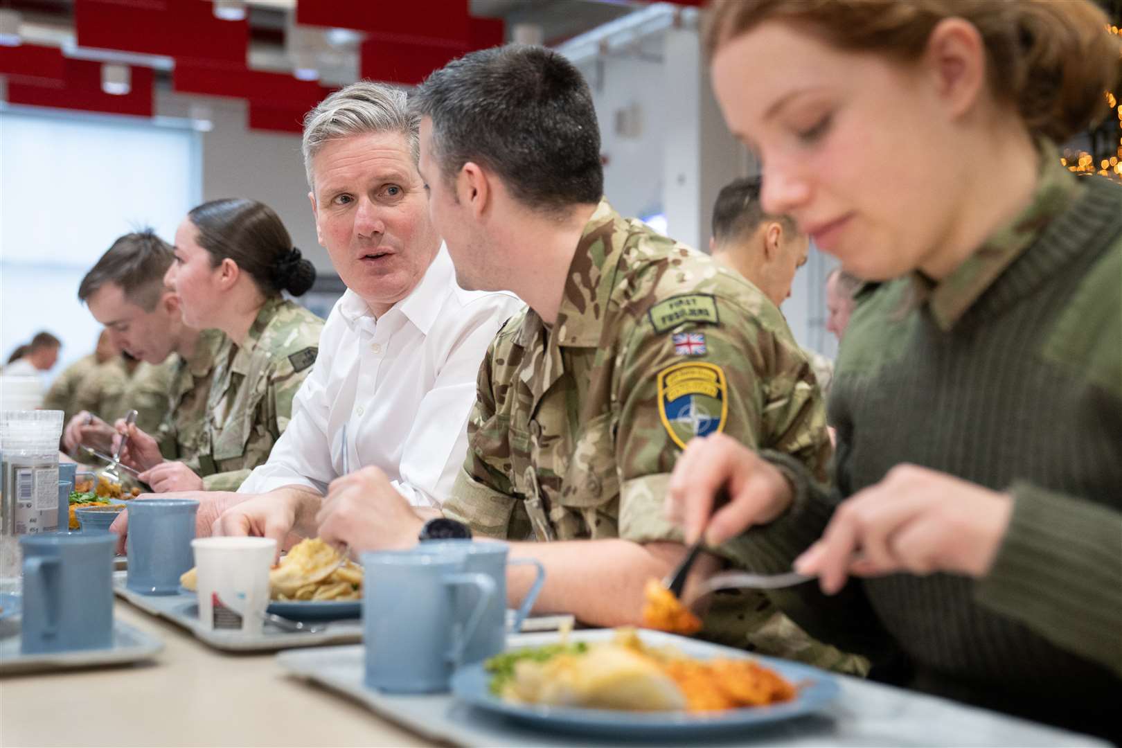 Sir Keir Starmer has lunch with members of the British armed forces at the Tapa Nato base in Estonia (Stefan Rousseau/PA)