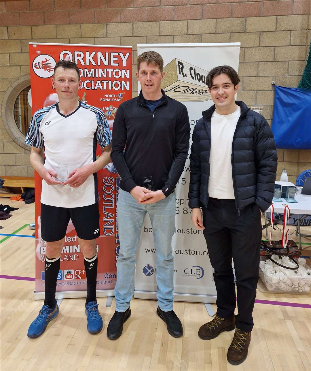 Men's doubles runners-up Mark Mackay and Martyn Cook with sponsors' representative Jamie Clouston.