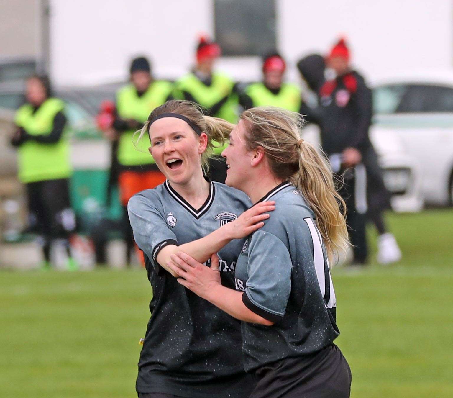 Carly Erridge (left) is congratulated by Kerrie Martin on scoring her 2nd goal