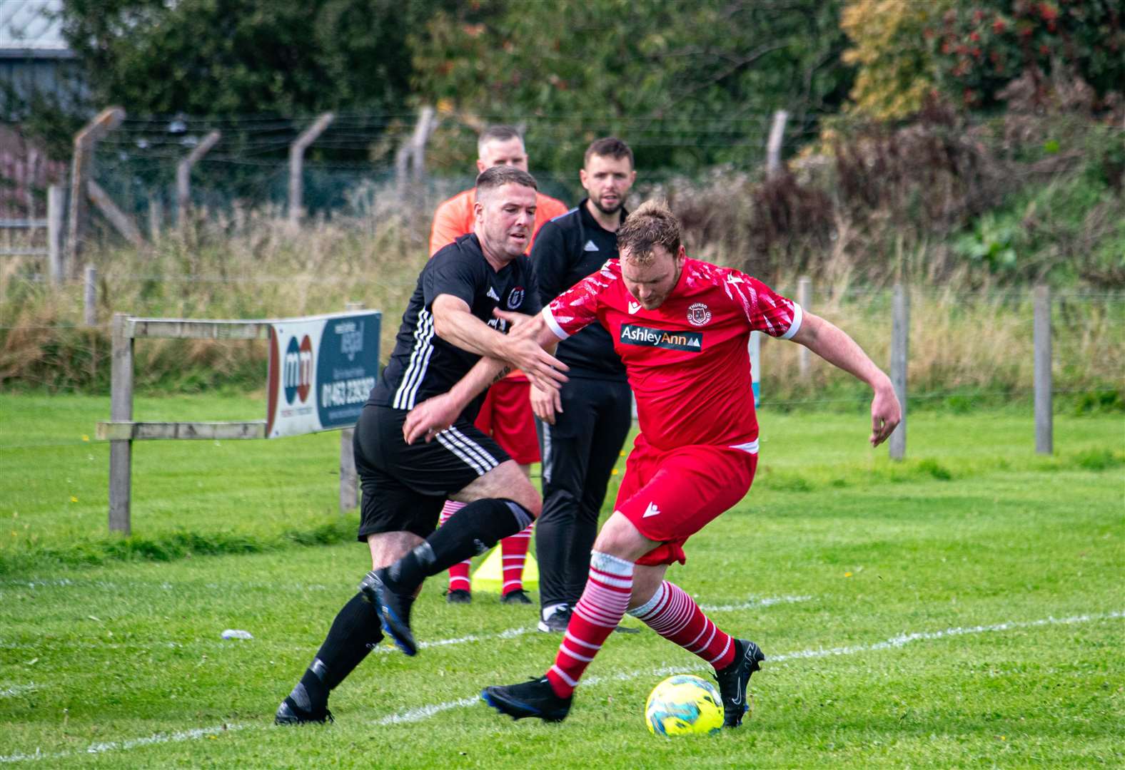 Paul Loughlin of St Duthus and James Murray of Thurso battling for possession at Grant Park last month. Picture: Niall Harkiss
