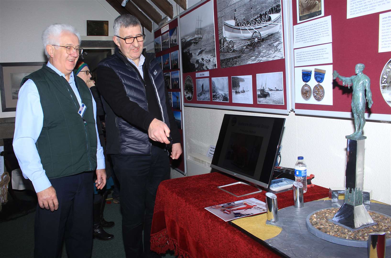 Willie Watt of the Seafarers Memorial Group with Malcolm Bremner (left), vice-chairman of the Wick Society, at the museum open day. Picture: Alan Hendry
