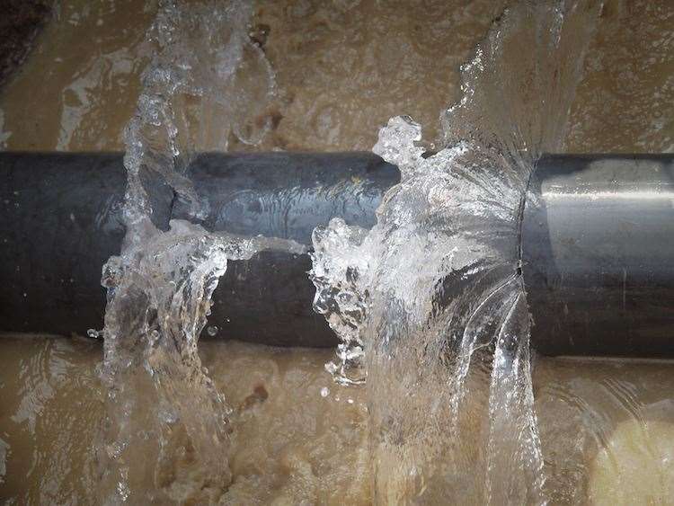 A burst water pipe (stock image).