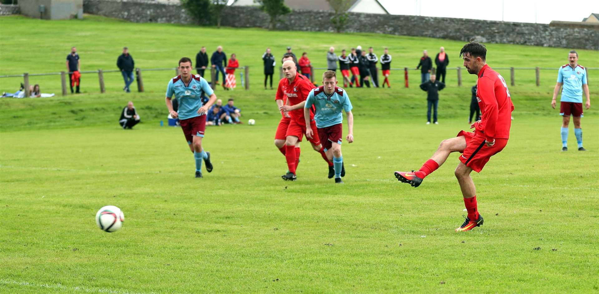 Graham MacNab scores Wick Groats' second goal from the penalty spot. Picture: James Gunn