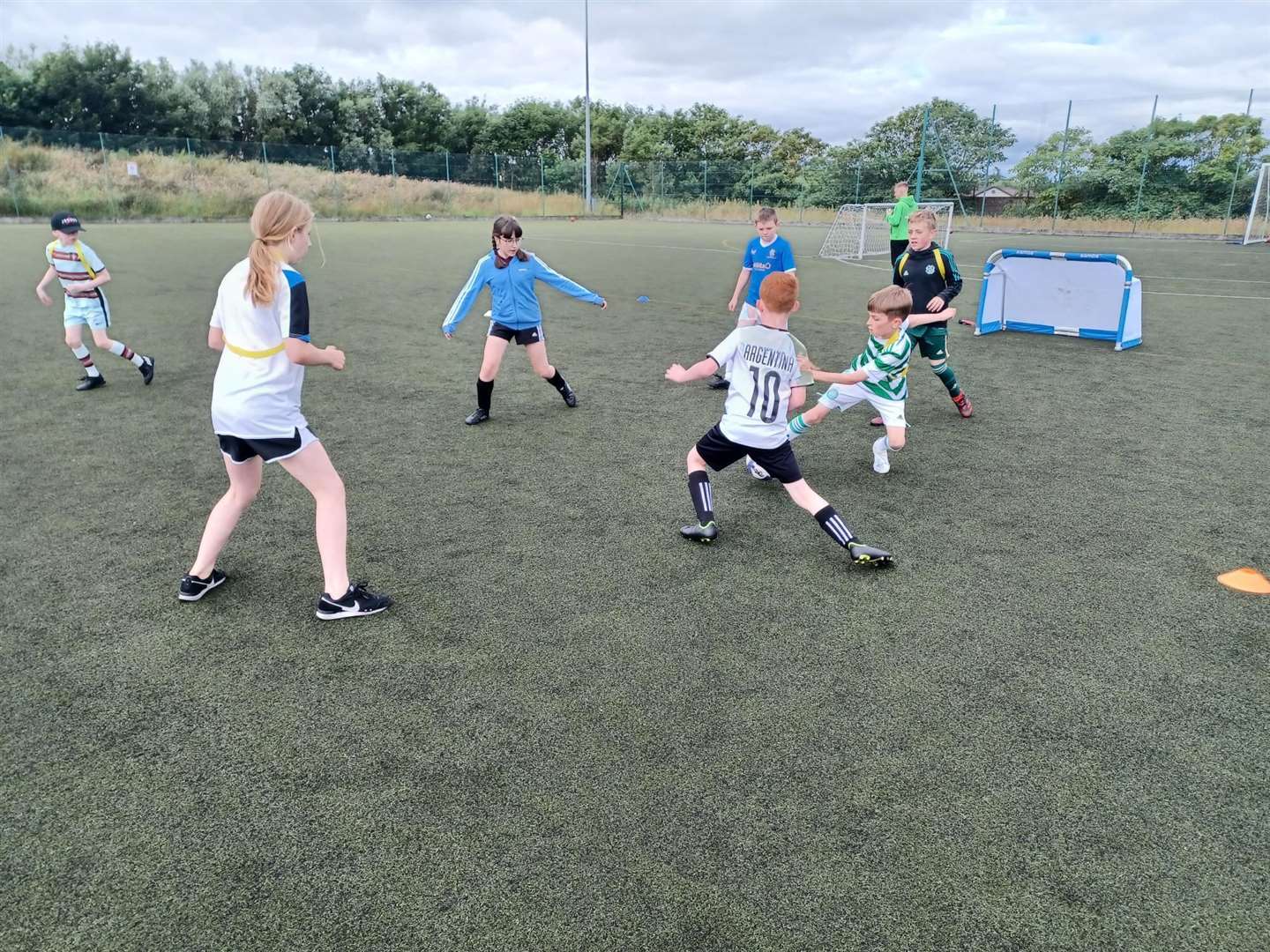 In action on the mini football pitch.