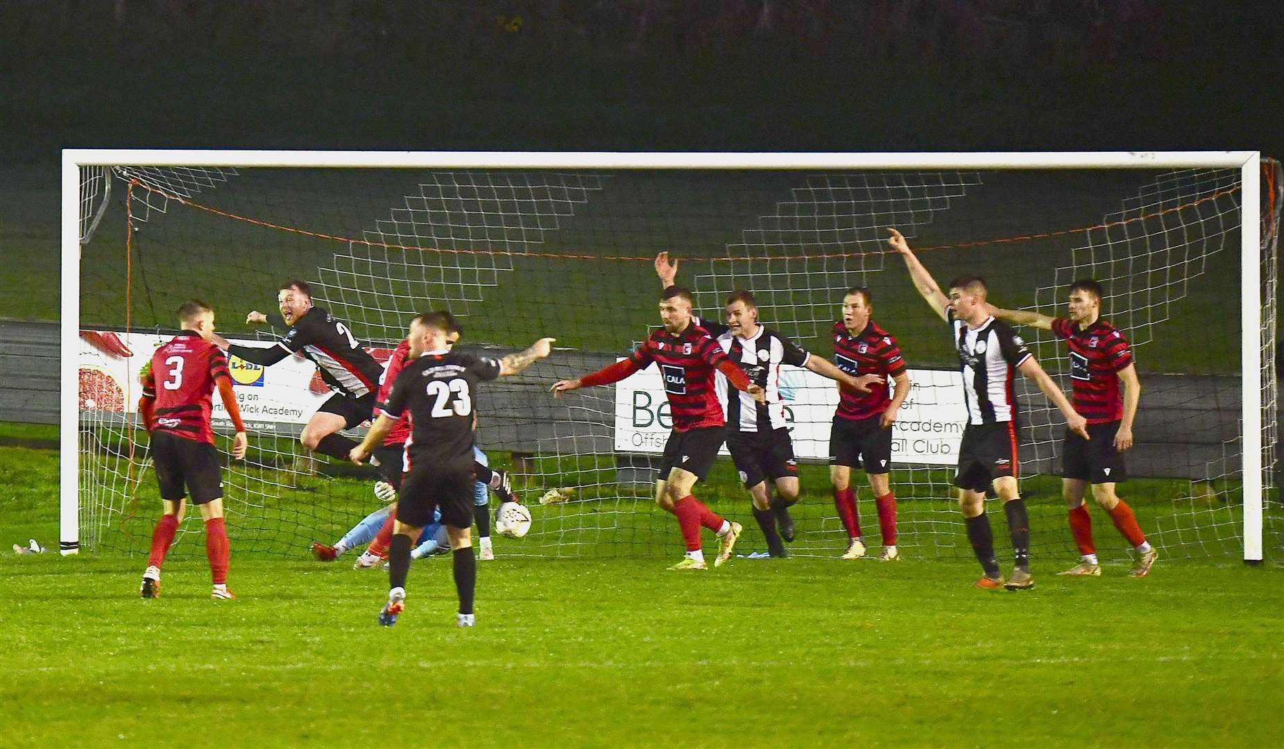 Rob McLean turns to celebrate as his header seals the win for Wick Academy. Picture: Mel Roger