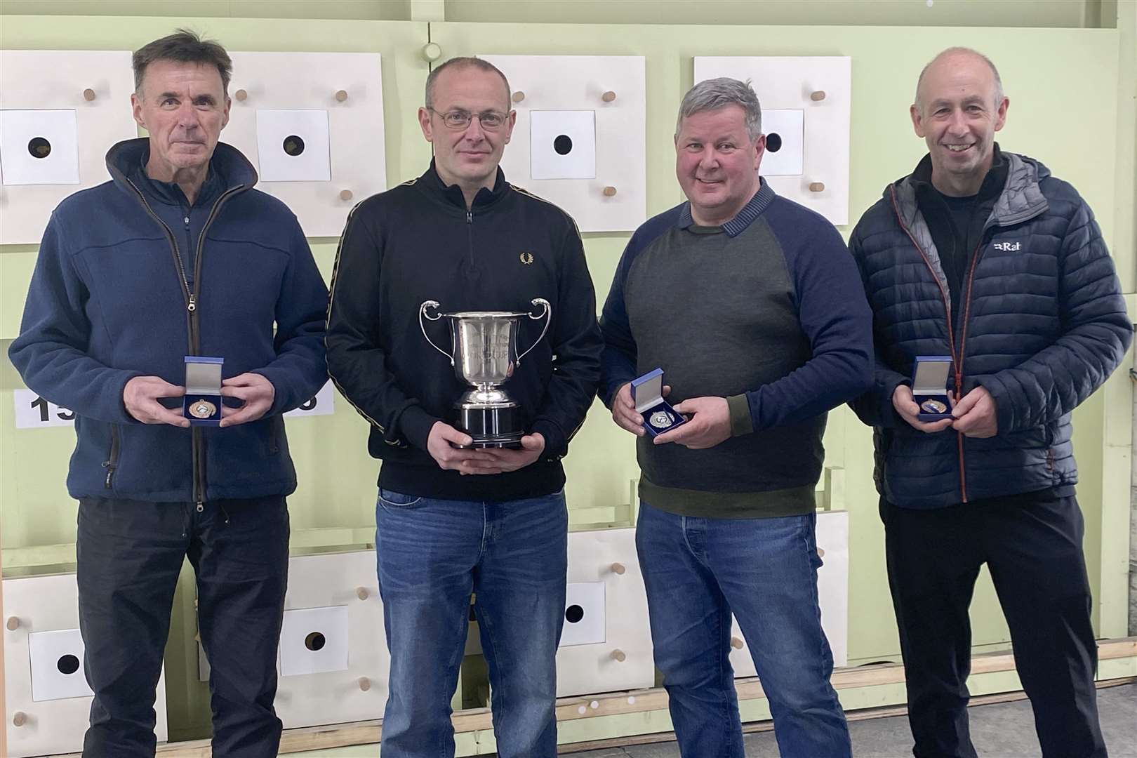 Competition winner David Simpson (second from left) with David Bremner (left), Hugh Simpson and Robbie Campbell (right). Picture: Robert MacDonald / Northern Studios