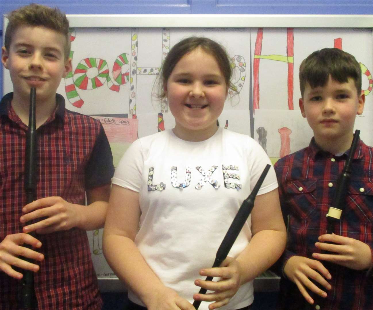 The trio of chanter players who played Amazing Grace at Miller Academy's Scottish show.