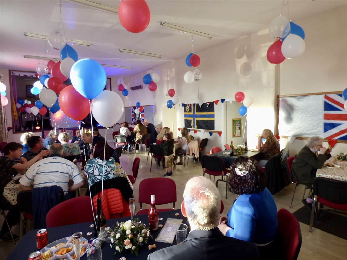 The village hall was transformed into a sea of red, white and blue.