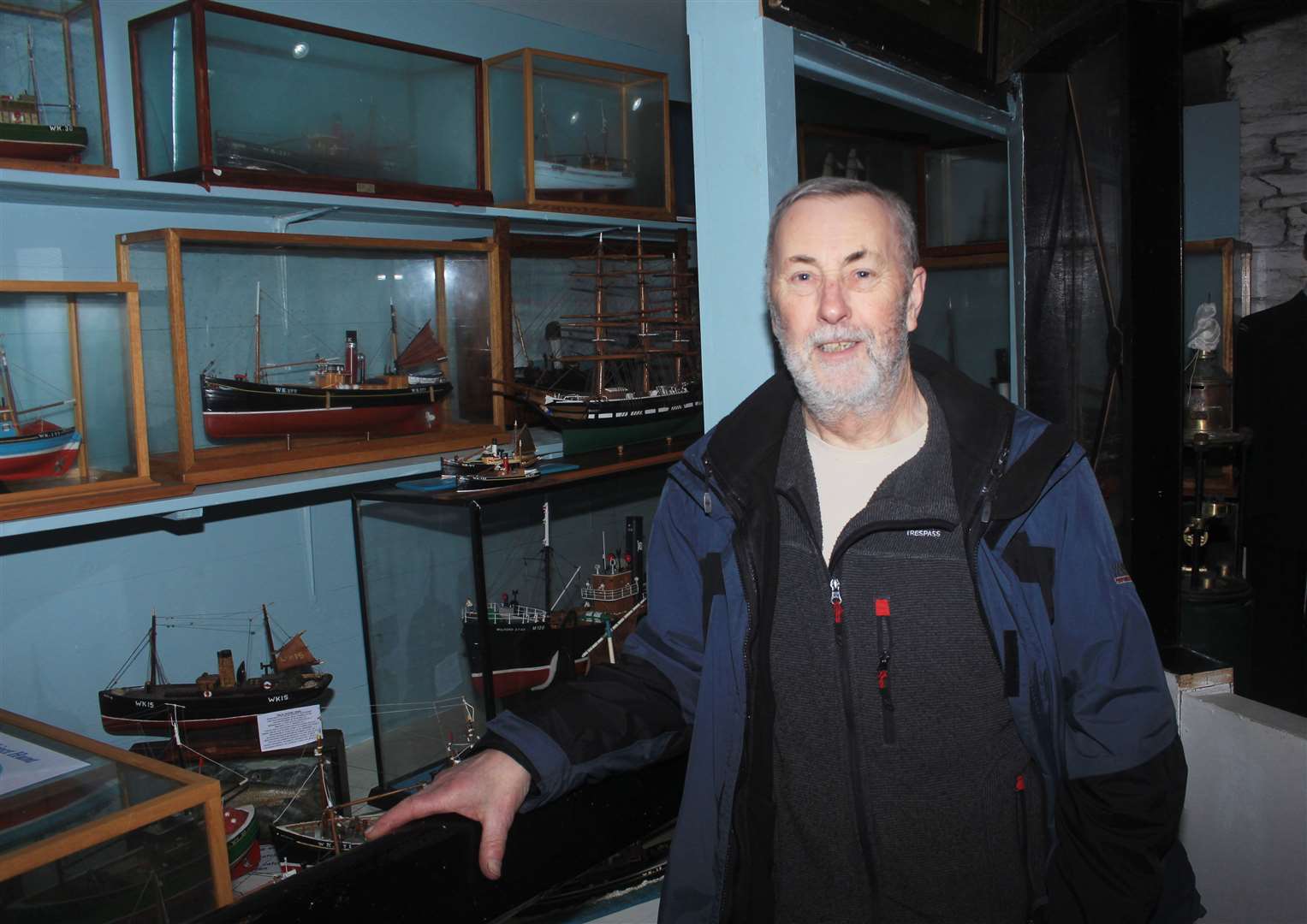 John Webster beside a display of model boats, some of which he himself restored. Picture: Alan Hendry