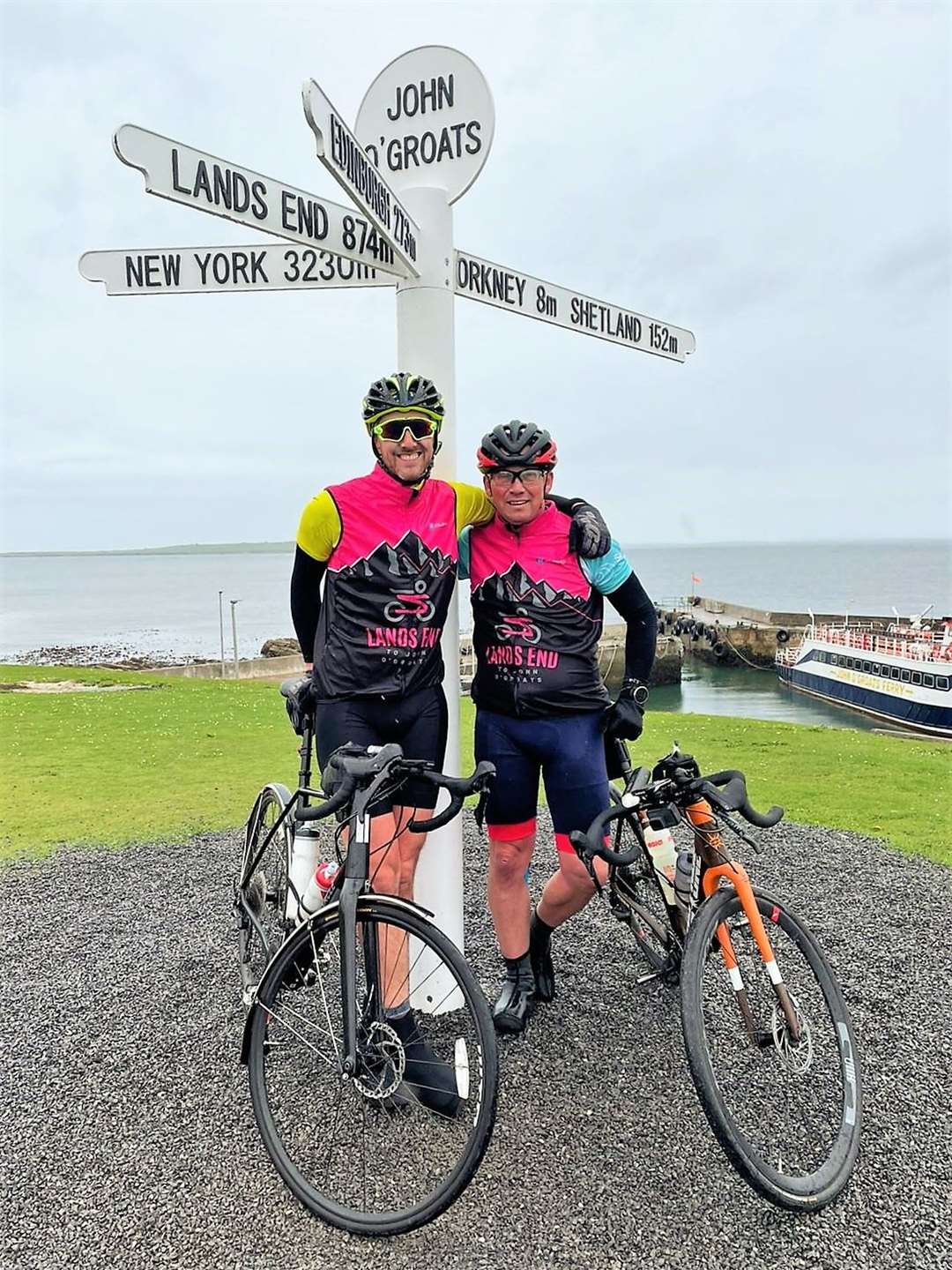 Edward Ryan, left, and Phill Jenner make it to Groats after setting off from Land's End on May 1.