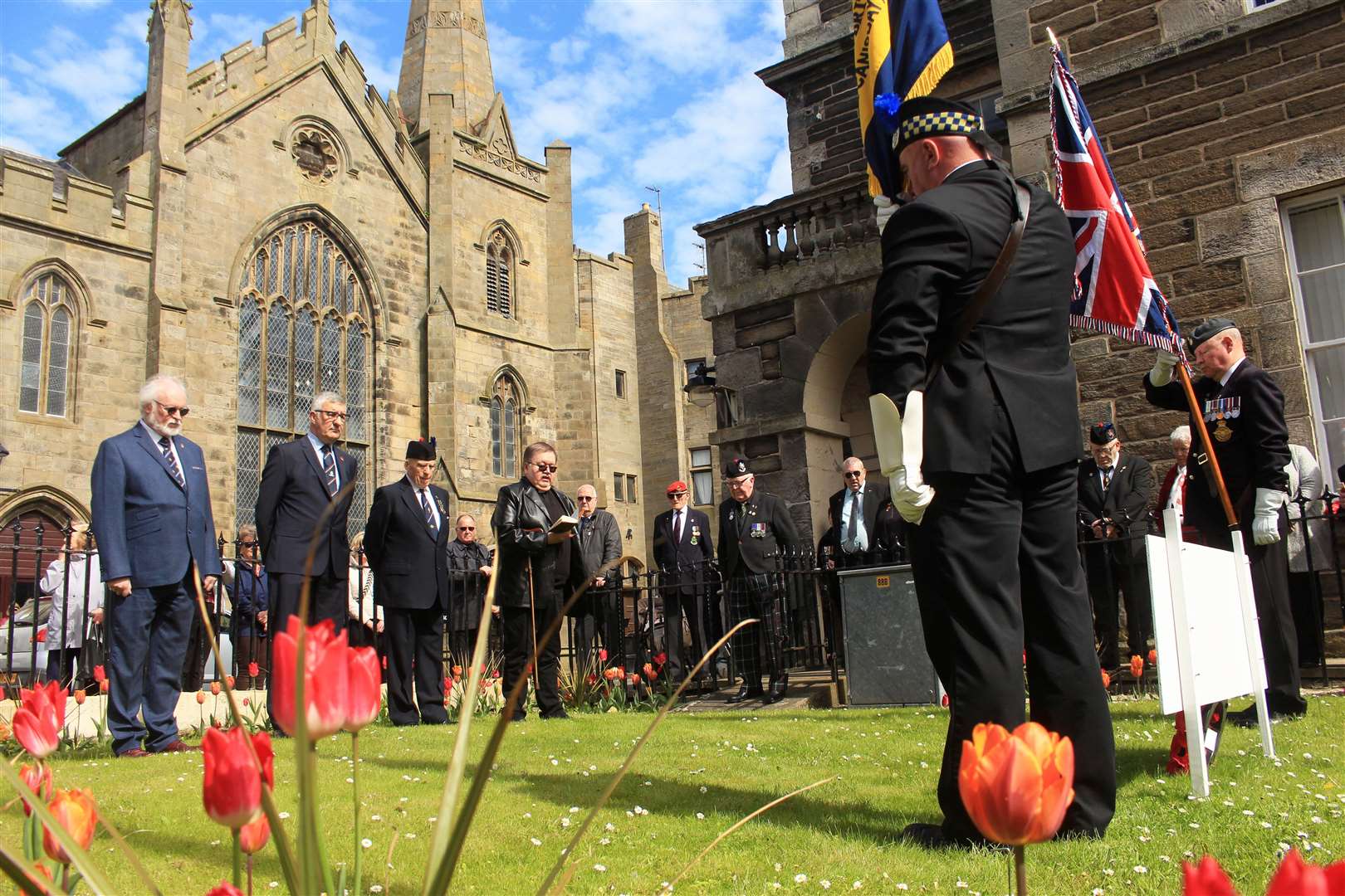 The Rev John Nugent giving a reading at the 80th anniversary commemoration. Picture: Alan Hendry