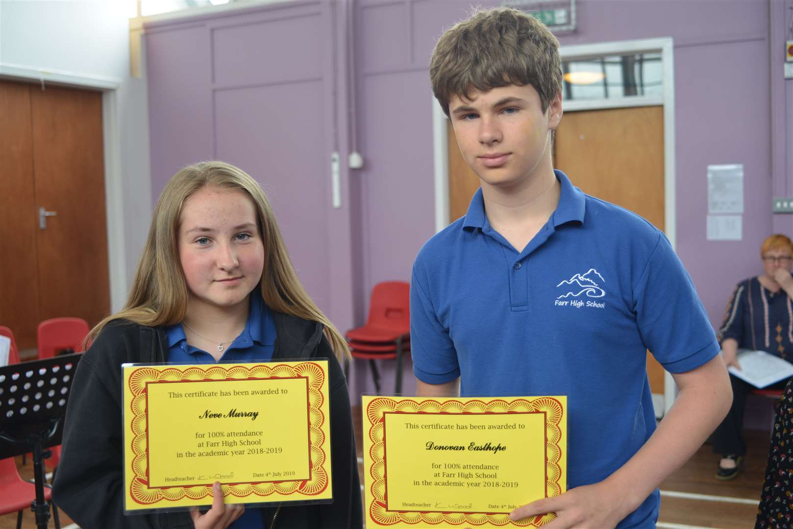 Neve Murray and Donovan Easthope with their certificates of perfect attendance in 2018/19. Pictures: Jim A Johnston
