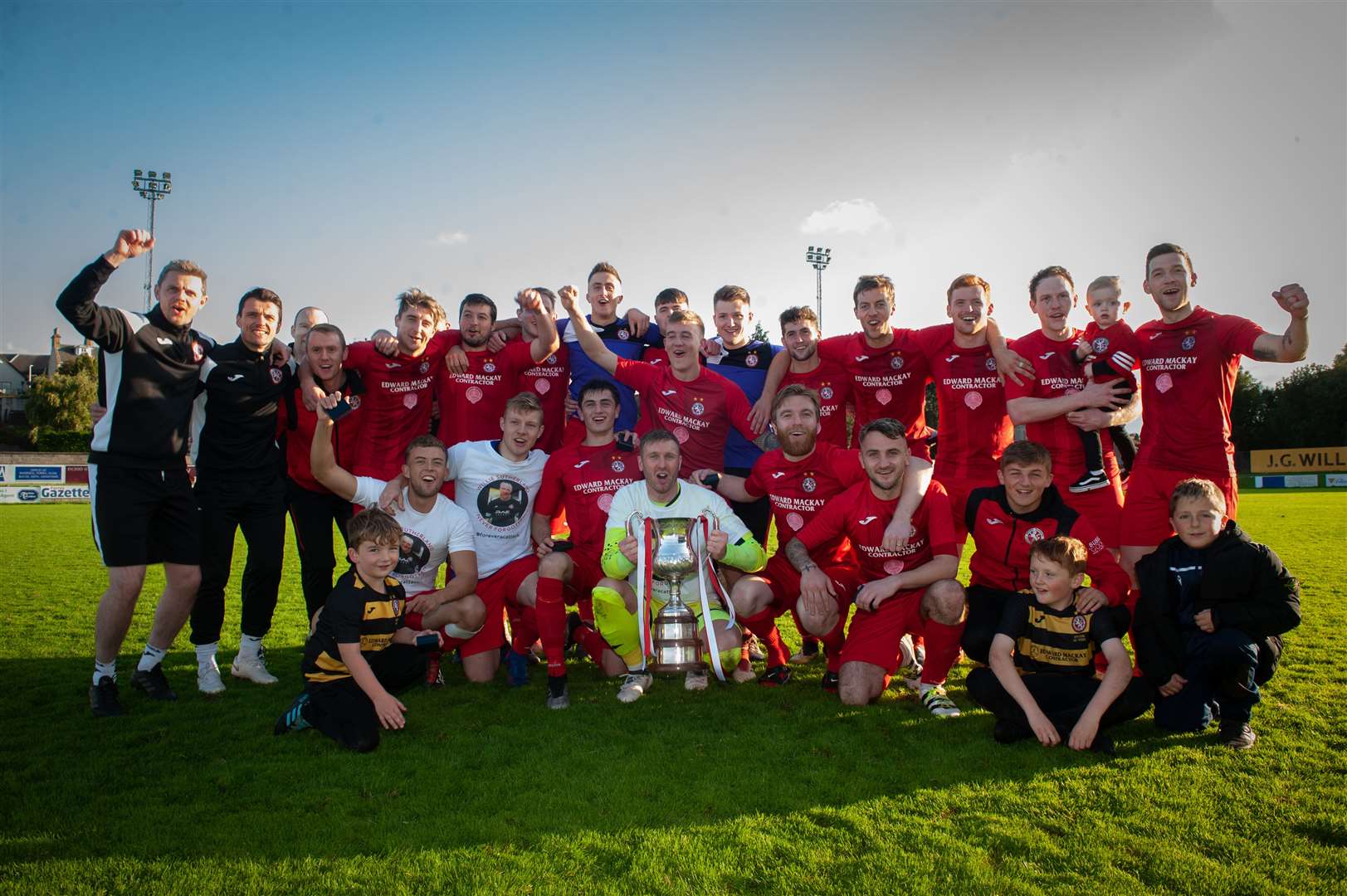 Celebrations for Brora Rangers after the North of Scotland Cup final victory over Caley Thistle last October. Picture: Callum Mackay