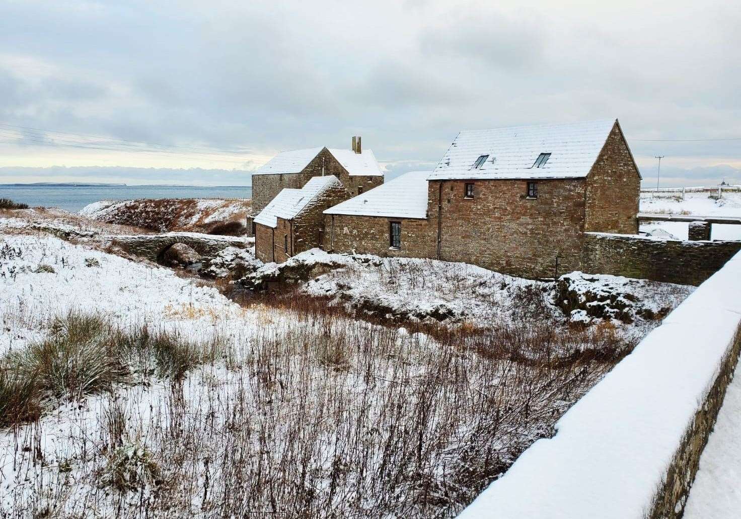 The historic mill at John O'Groats after recent snowfall. Picture: Rognvald Brown