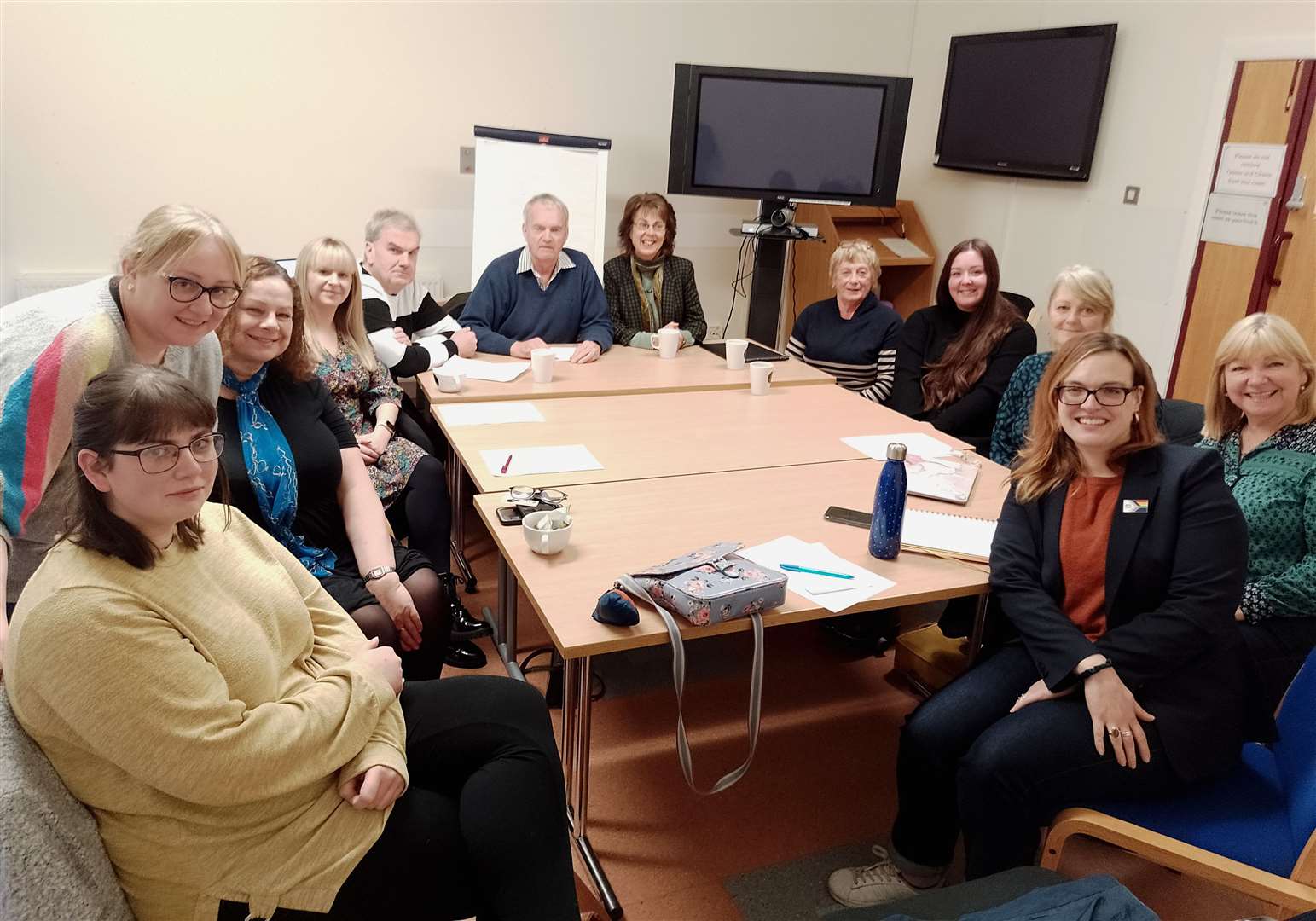 Representatives of CHAT and North Highland Women's Wellbeing Hub with the visitors from NHS Highland in the conference room at Caithness General Hospital.