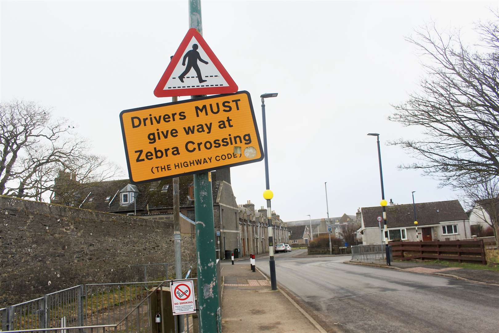There are zebra crossing signs, and flashing lights – but no white stripes on the road. Picture: Alan Hendry