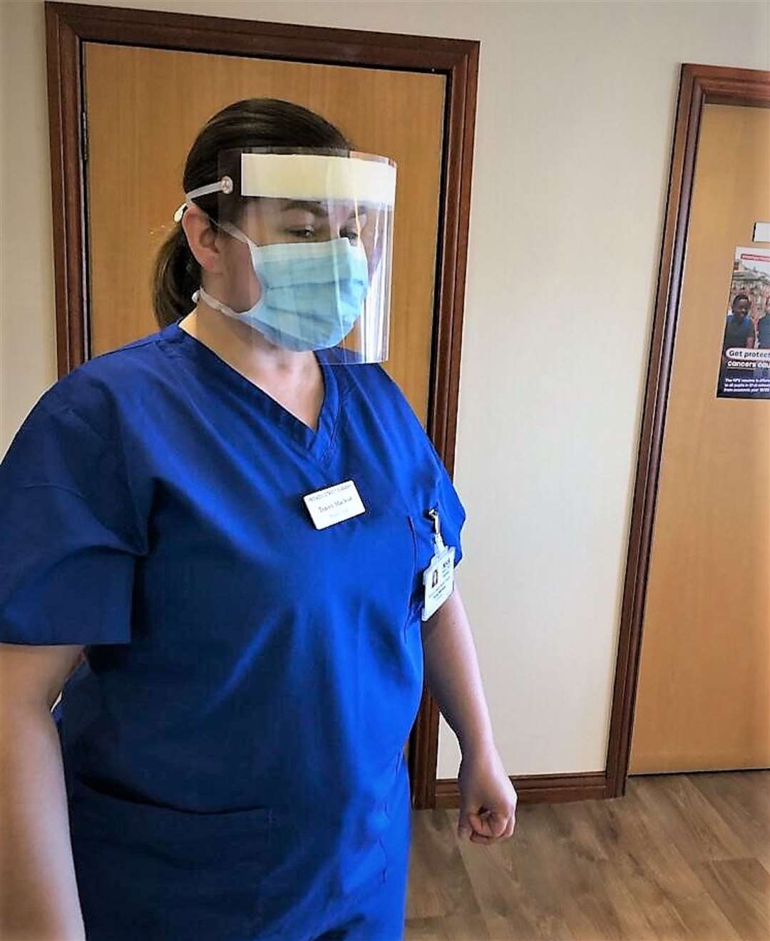 Tracey Macleod, a practice nurse in Thurso's Princes Street clinic, wearing some of the PPE purchased through money donated by the Halkirk and District Benefit Fund.