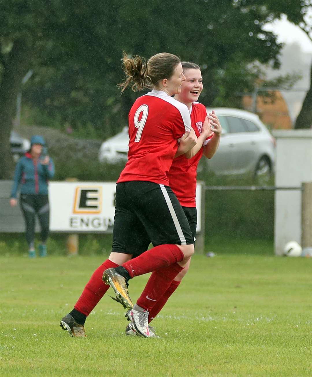 No. 9 Carly Erridge congratulates Anna Foubister on scoring her first goal for the team. Picture: James Gunn