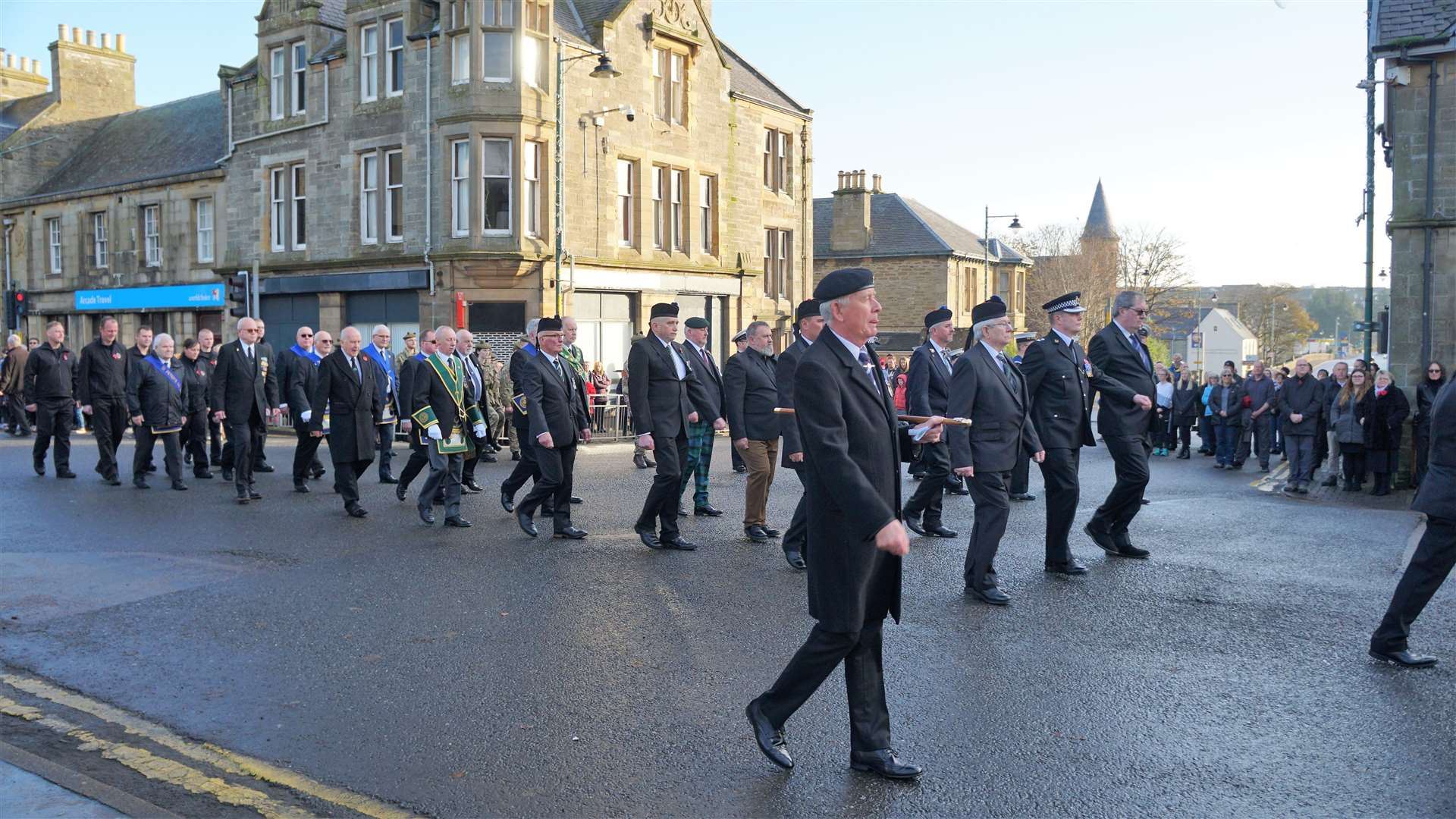 Parade members move off from the war memorial at the end of the service in Sir John's Square. Picture: DGS