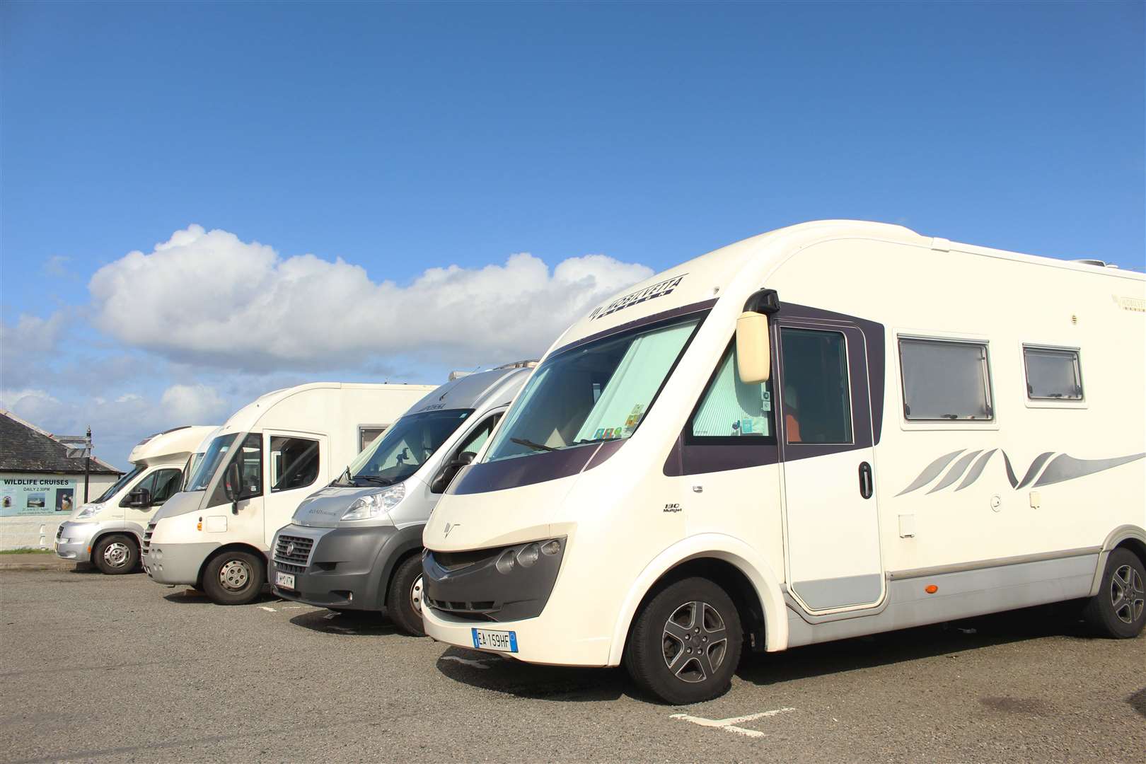 Campervans in the John O'Groats car park this summer. The village is a key destination on the North Coast 500 route.