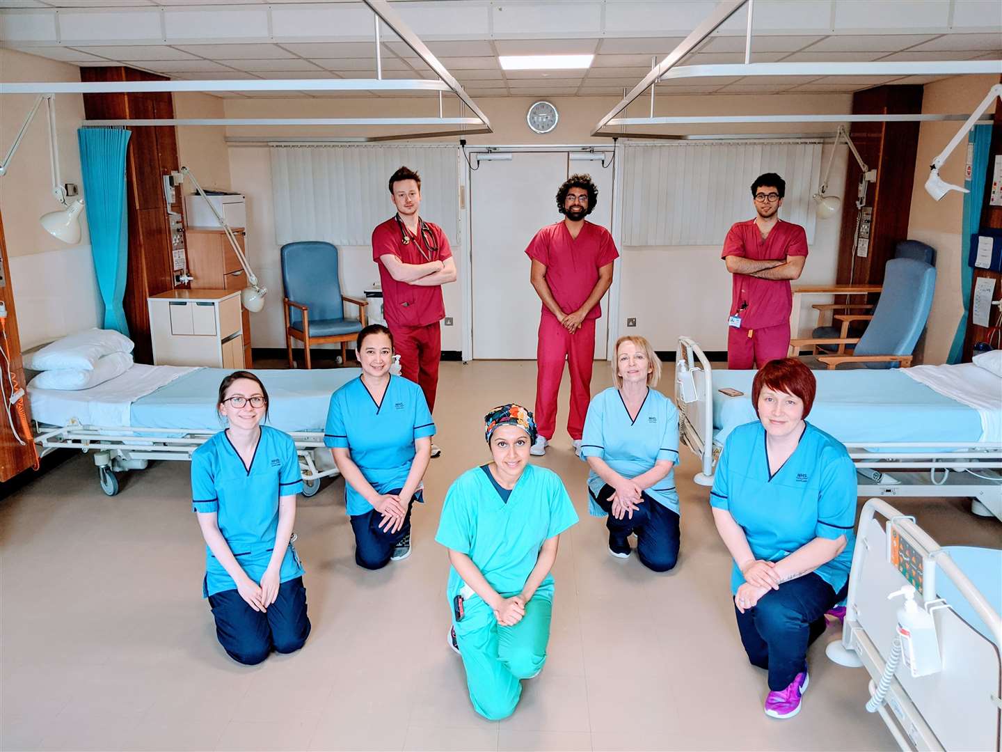 Some of the staff at Caithness General Hospital after the video call with Victoria Beckham. Dr Hina Jamall can be seen at the front, with her husband Dr Danish Humayon in the middle at the back. Among those looking on are Bignold Wing staff nurse Susan Roberson (front right), while in the second row are staff nurse Theresa Balatazar (left) and Yvonne Wilson.