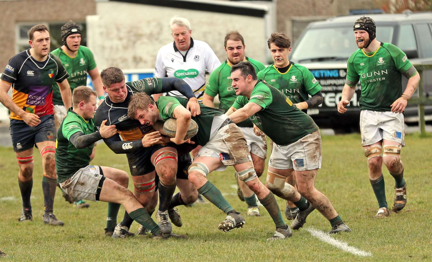 Tom Storey tries to battle his way through for the Greens. Picture: James Gunn