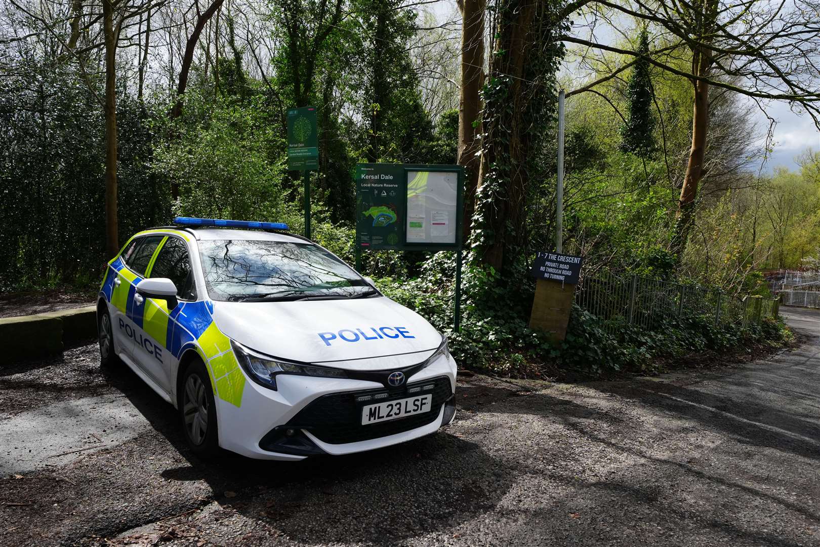 A police car parked at the entrance to Kersal Dale (Peter Byrne/PA)