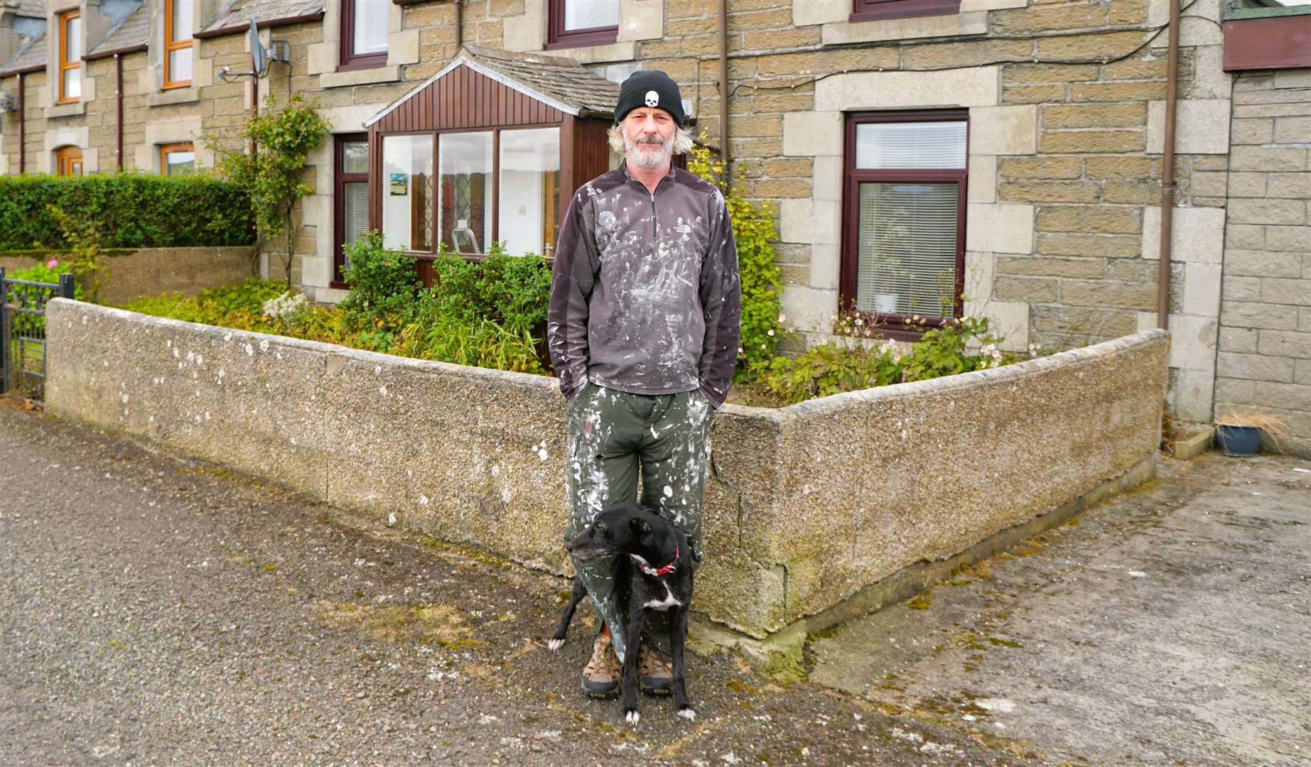 Rick Picken with his dog Smokey who he claims was attacked by one of the Labradors. Picture: DGS