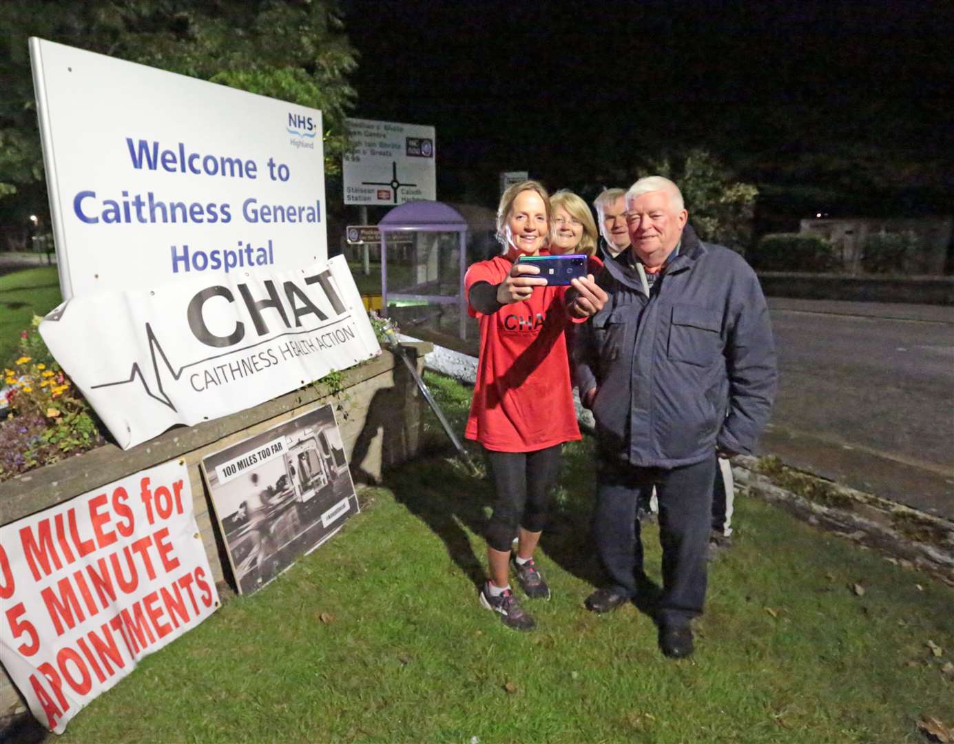 Lorna arrived at Caithness General Hospital at 4am on Wednesday and was met by CHAT's Bill Fernie (right), Derek Bremner and Maria Aitken. She took a selfie with the trio. Picture: Robert MacDonald / Northern Studios