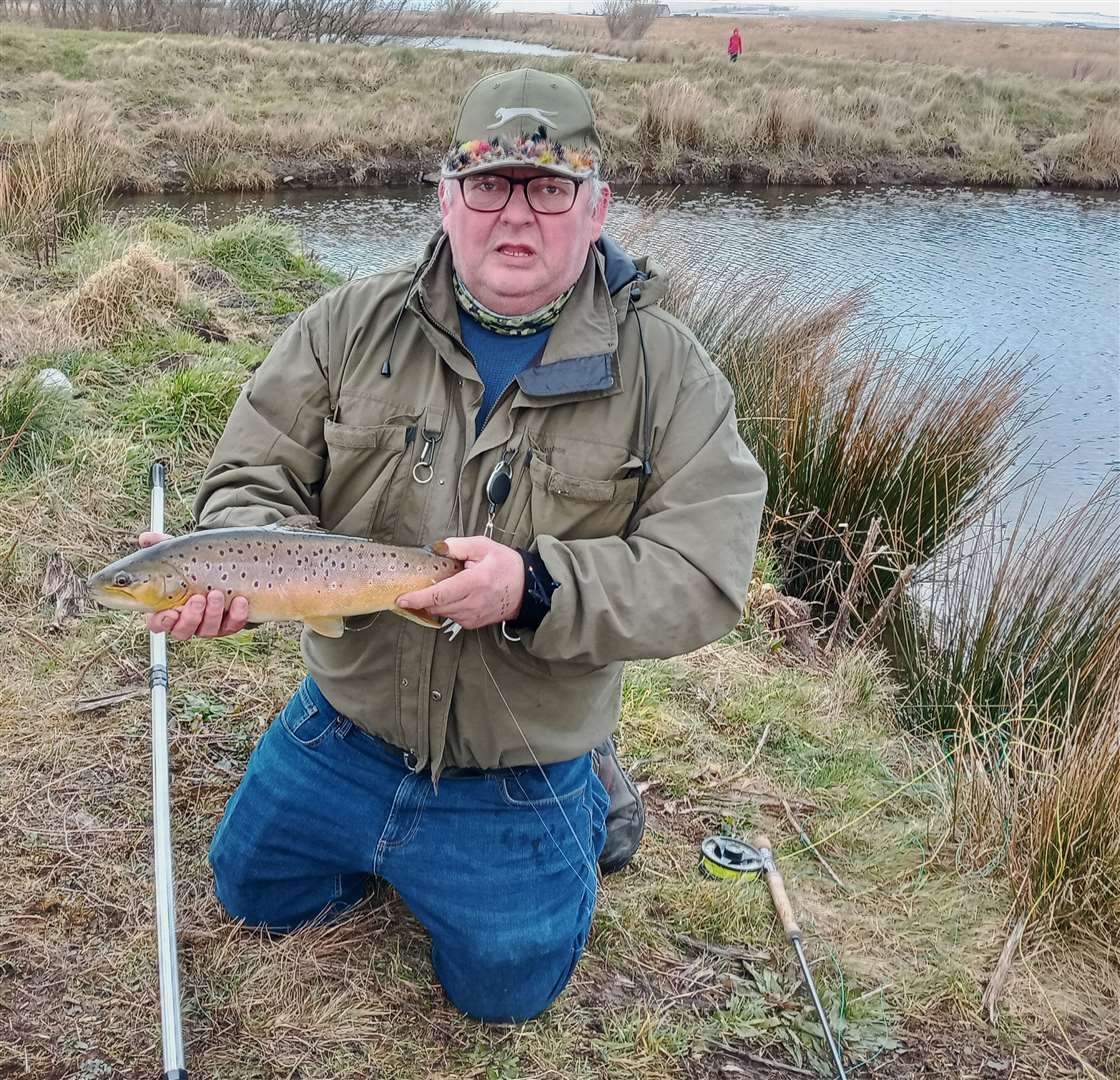 Ian Cannop after landing a nice wild brown trout of 3.5 lb.