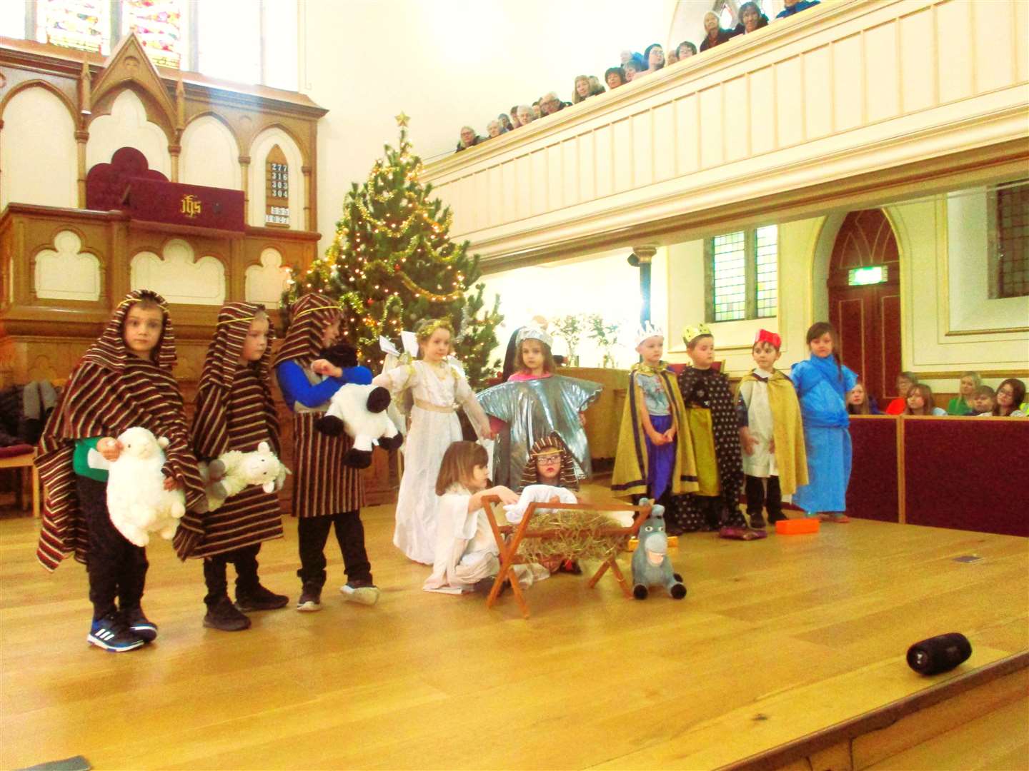 Miller Academy Primary School P1 act out Nativity scenes at Thurso's West Church.